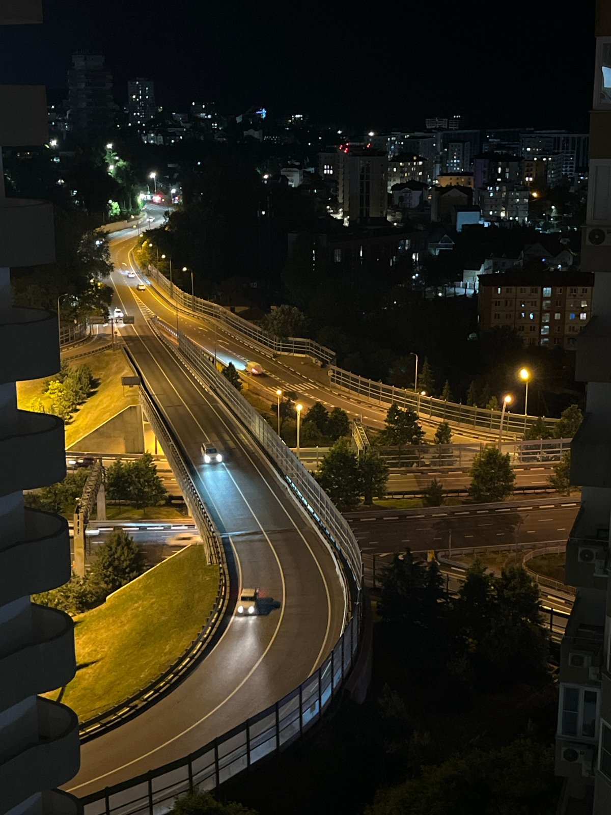 Sochi at dusk and night, from highway to hillside