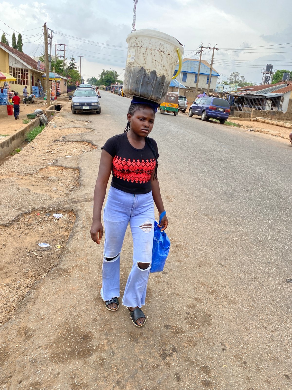 Afternoon street life documented across Bukuru, Nigeria neighborhoods