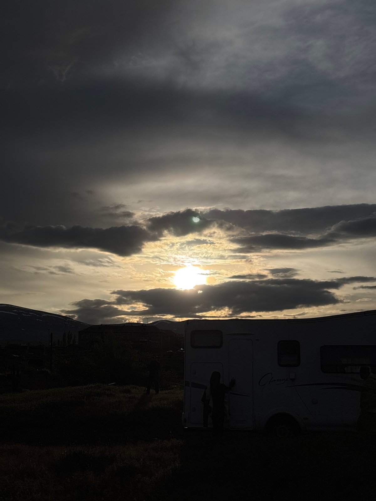 Visitor documents historic Armenian ruins during afternoon exploration