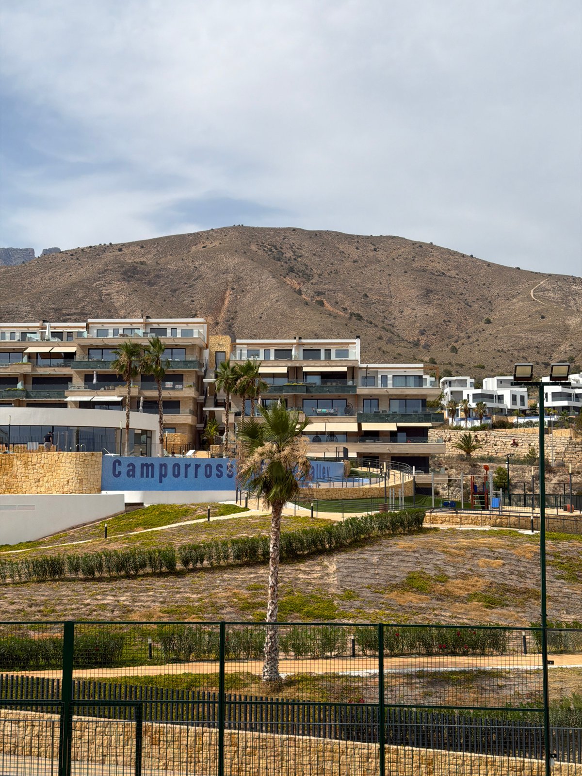 Afternoon at a modern hillside complex in Finestrat, Spain