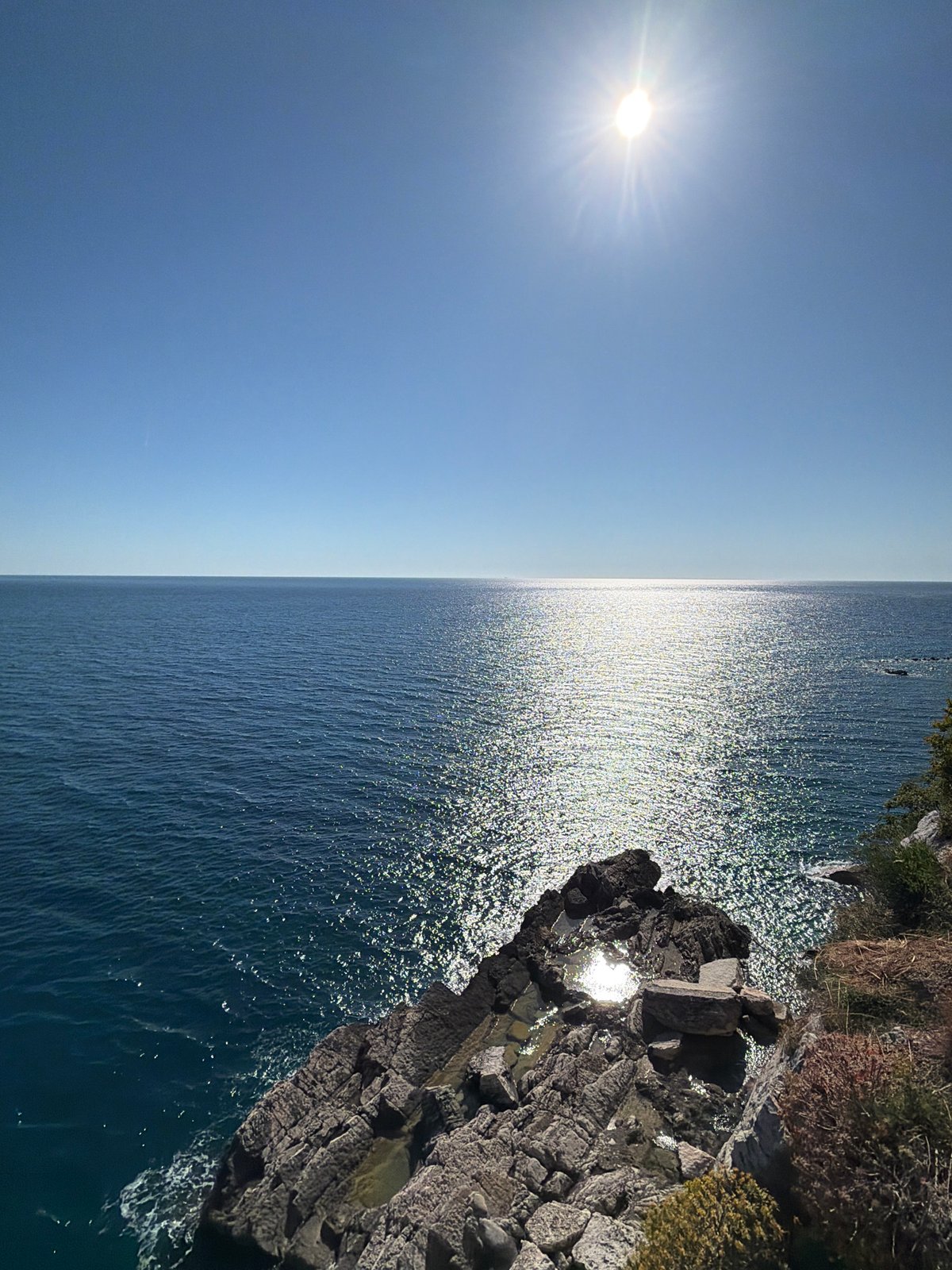 Visitor enjoys sunny coastal views at Mirište, Montenegro