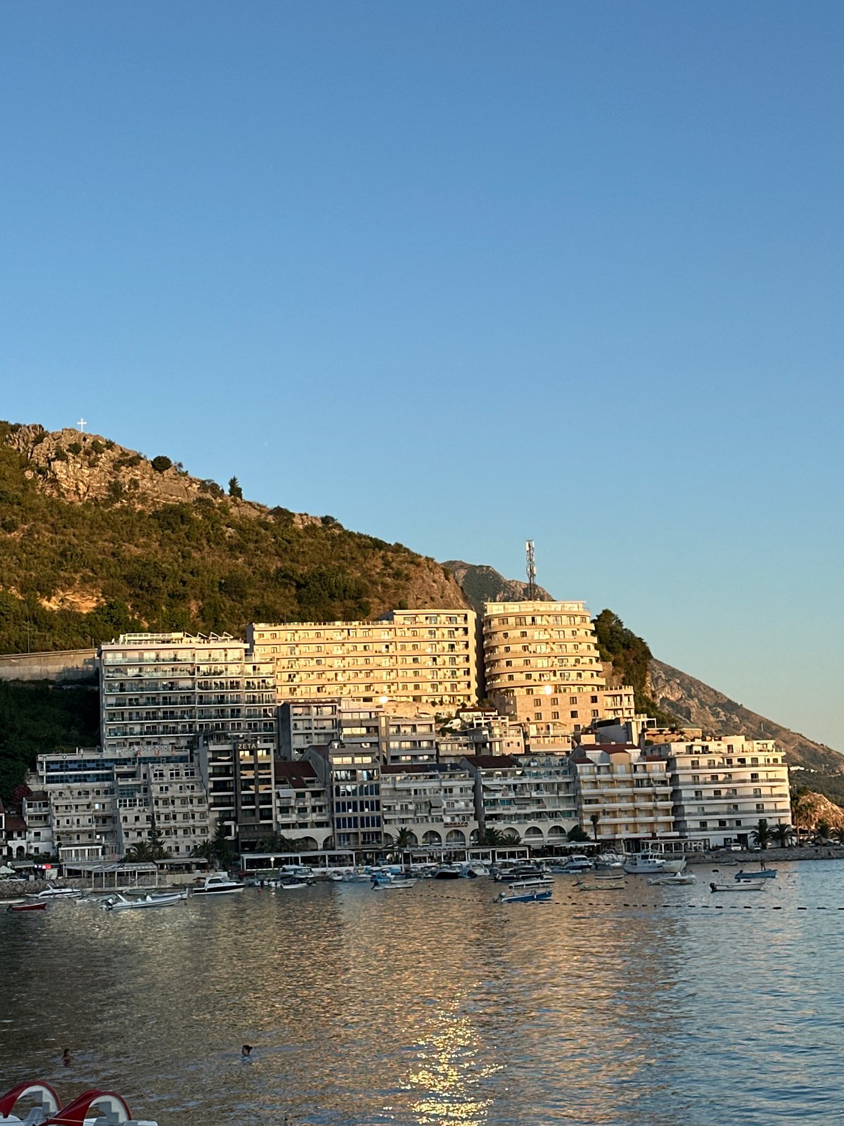 Golden hour on the Montenegrin coast, cafés and calm water