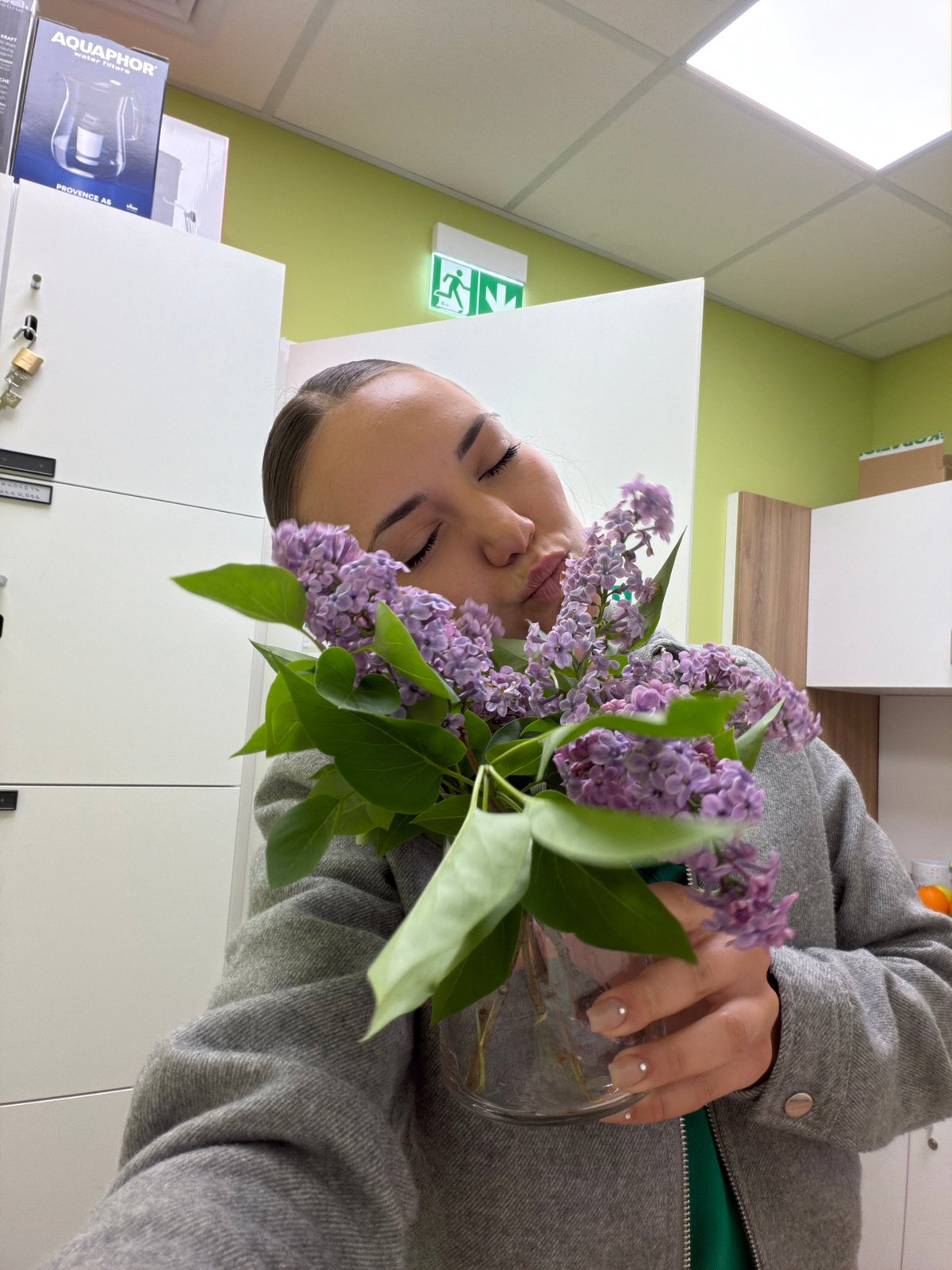 Woman with lilac bouquet spotted across multiple Sofia locations