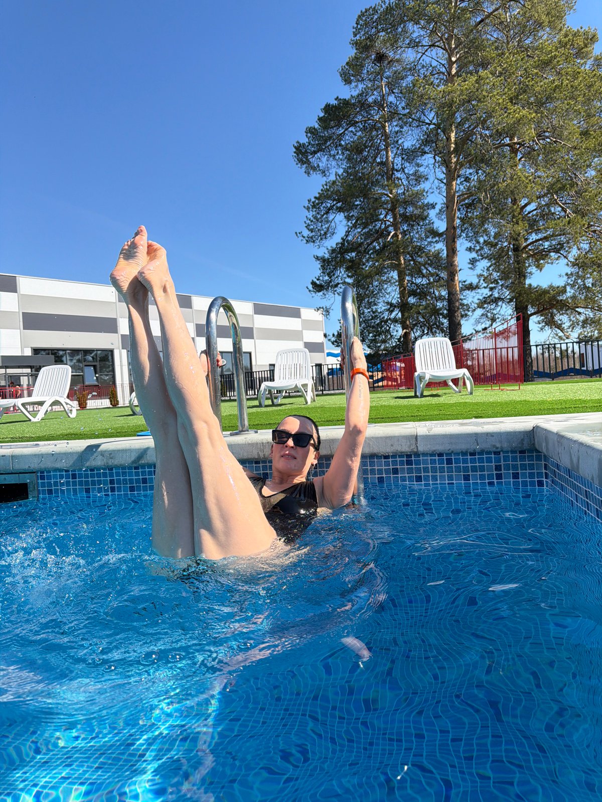 Woman enjoys morning swim at Votkinsk pool