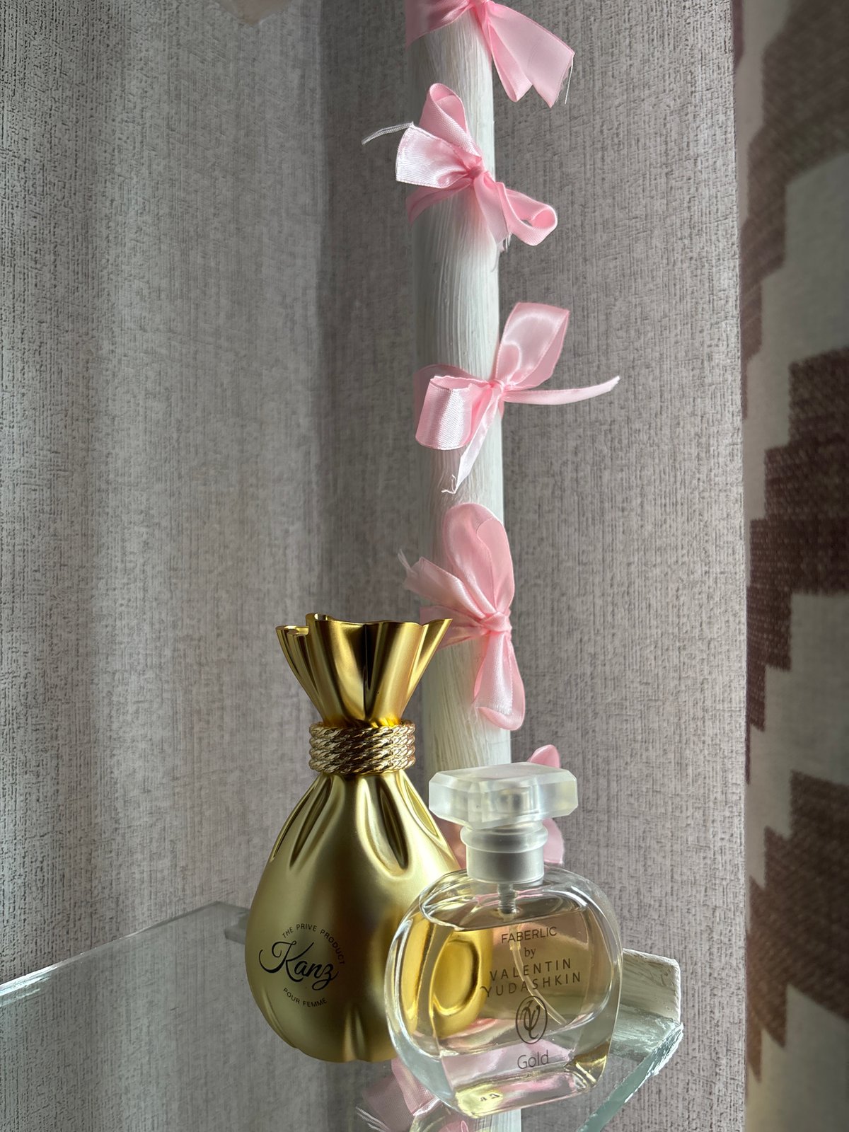 Dog owner documents quiet morning with sleeping pet, perfume display