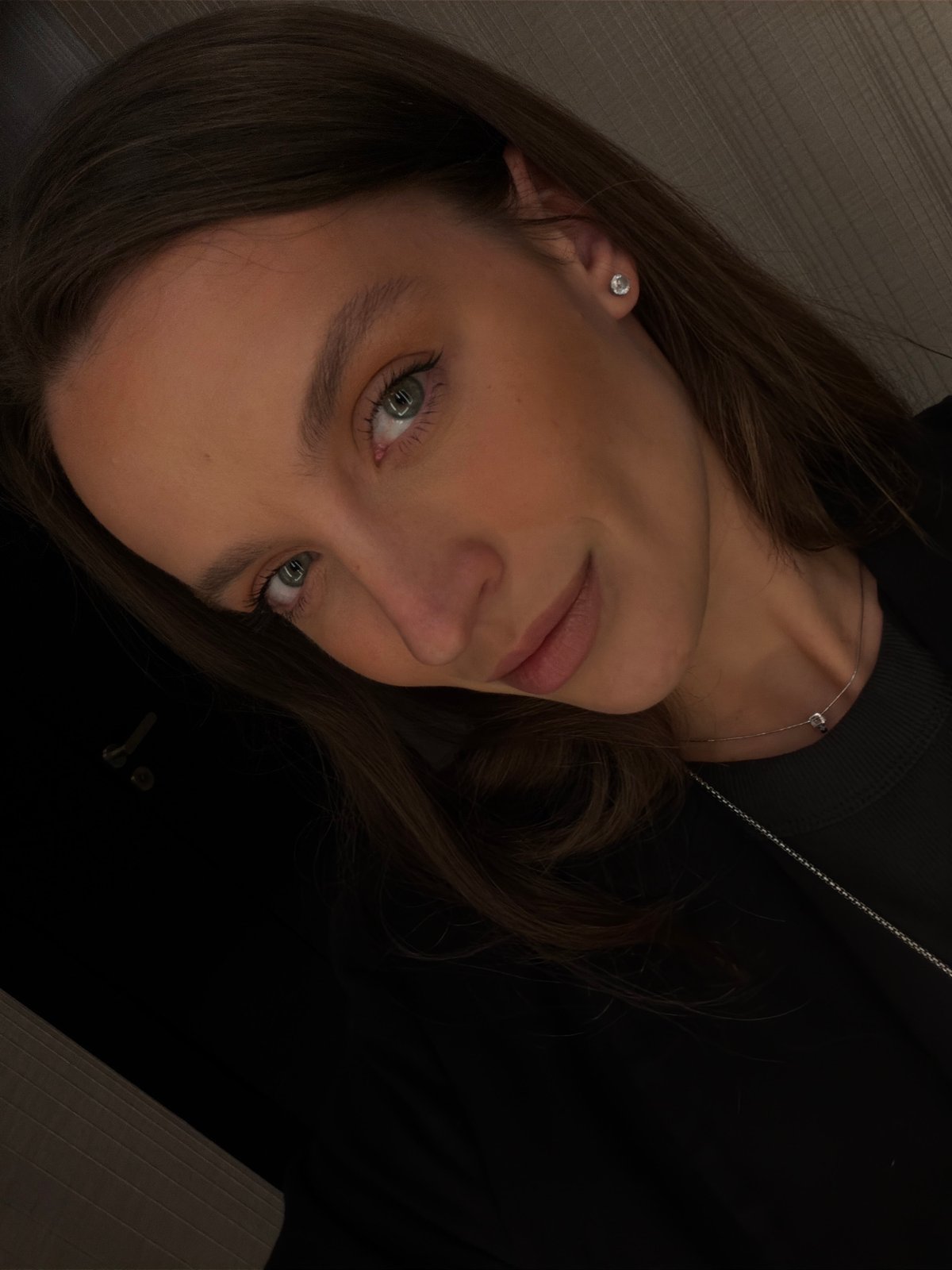 Woman takes selfies in Budva interior location