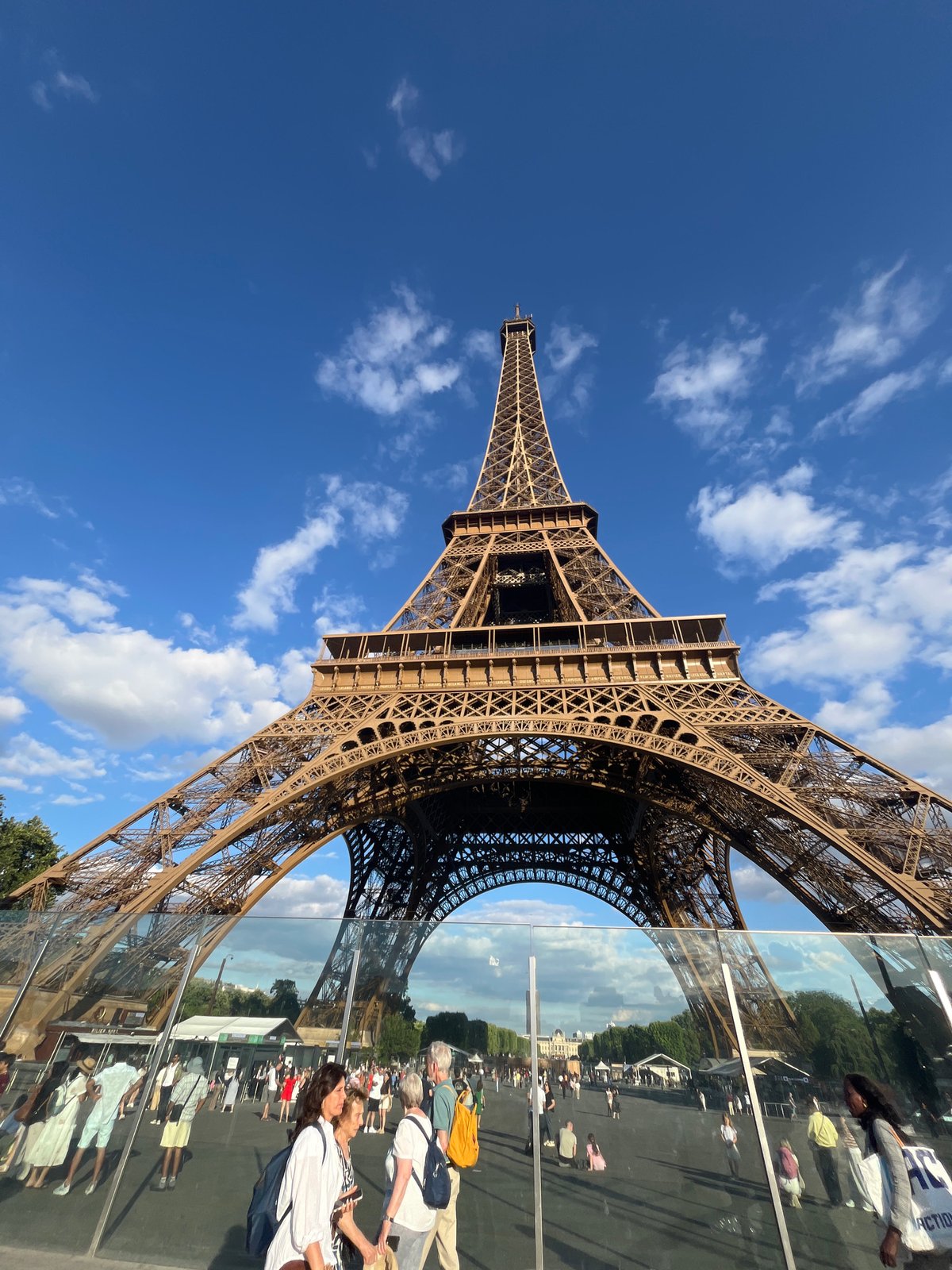 Eiffel Tower from below, clear July afternoon in Paris