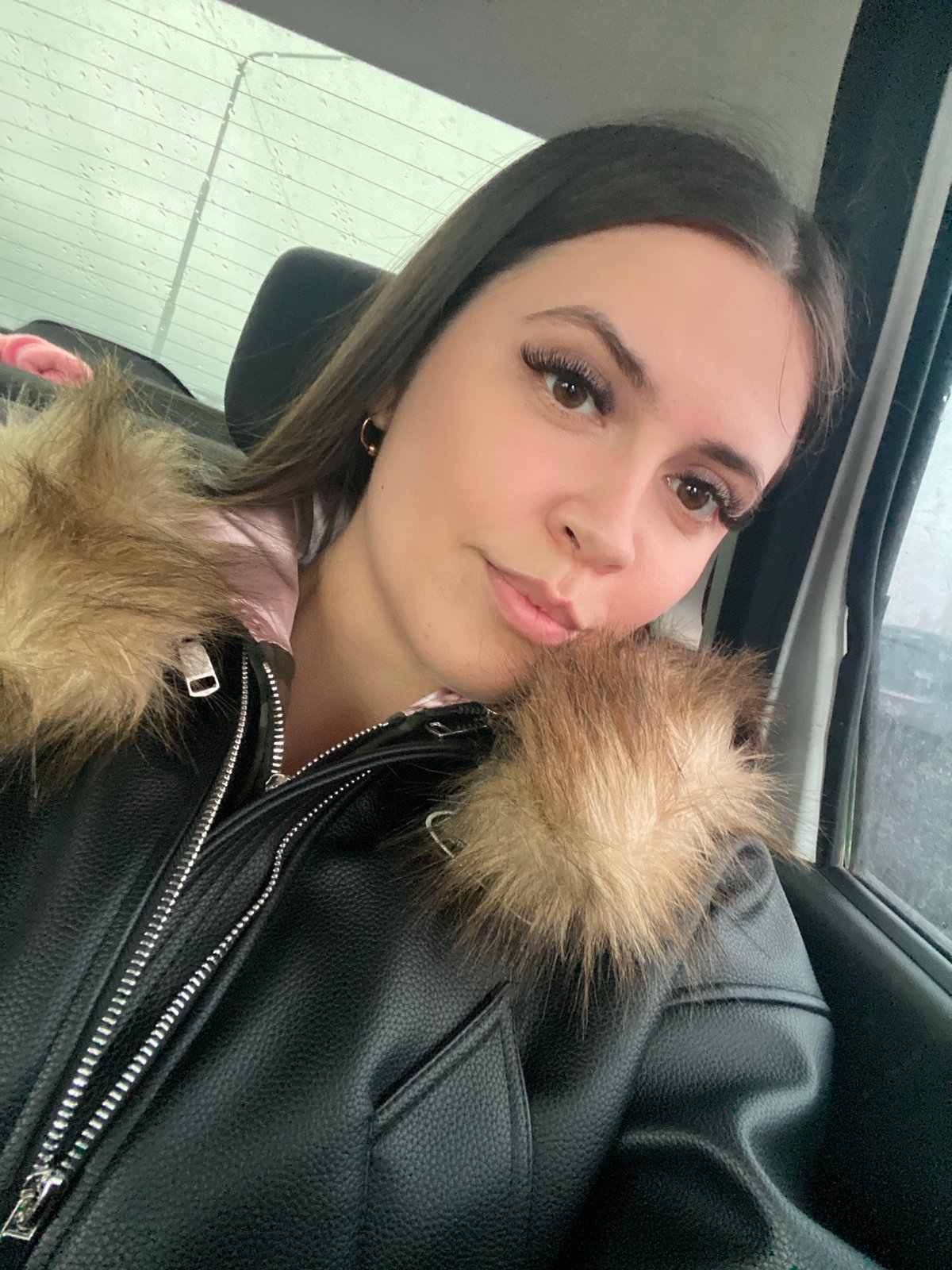 Woman takes selfie in snow in Chaikovsky, Russia