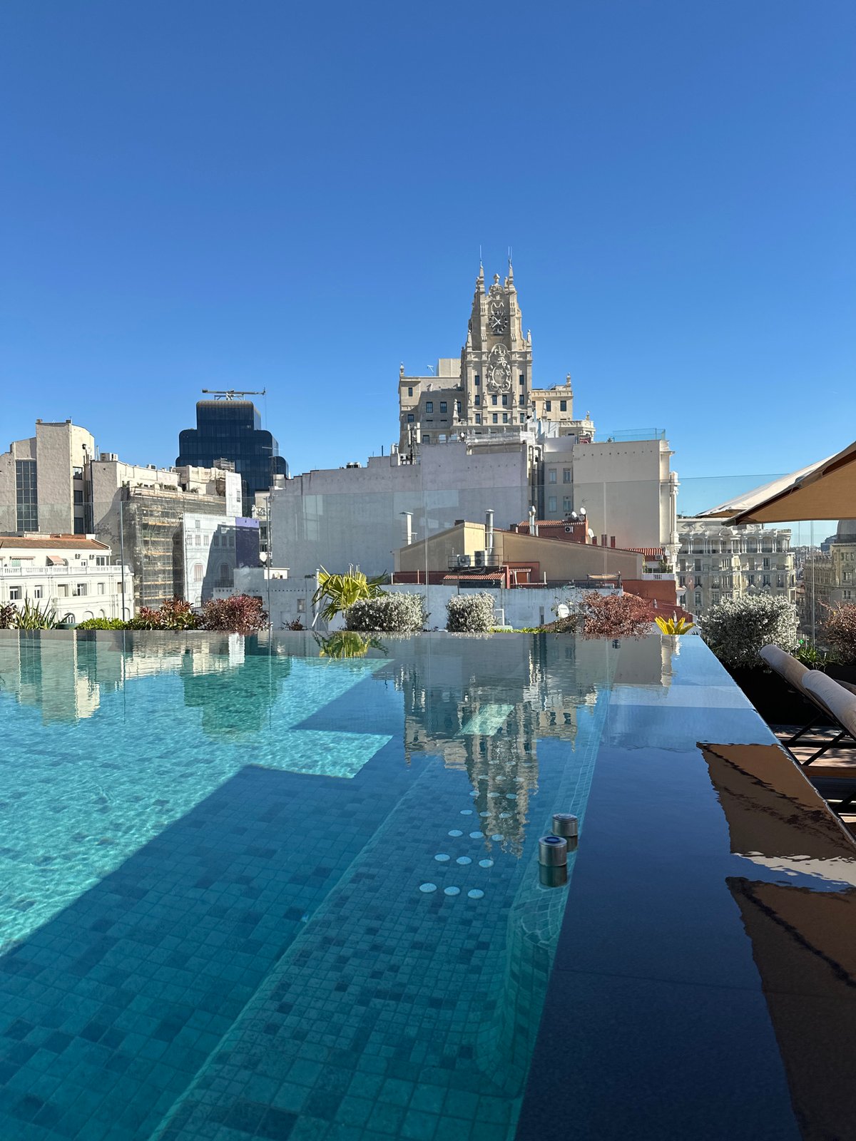 Madrid rooftop hotel breakfast and pool deck documented
