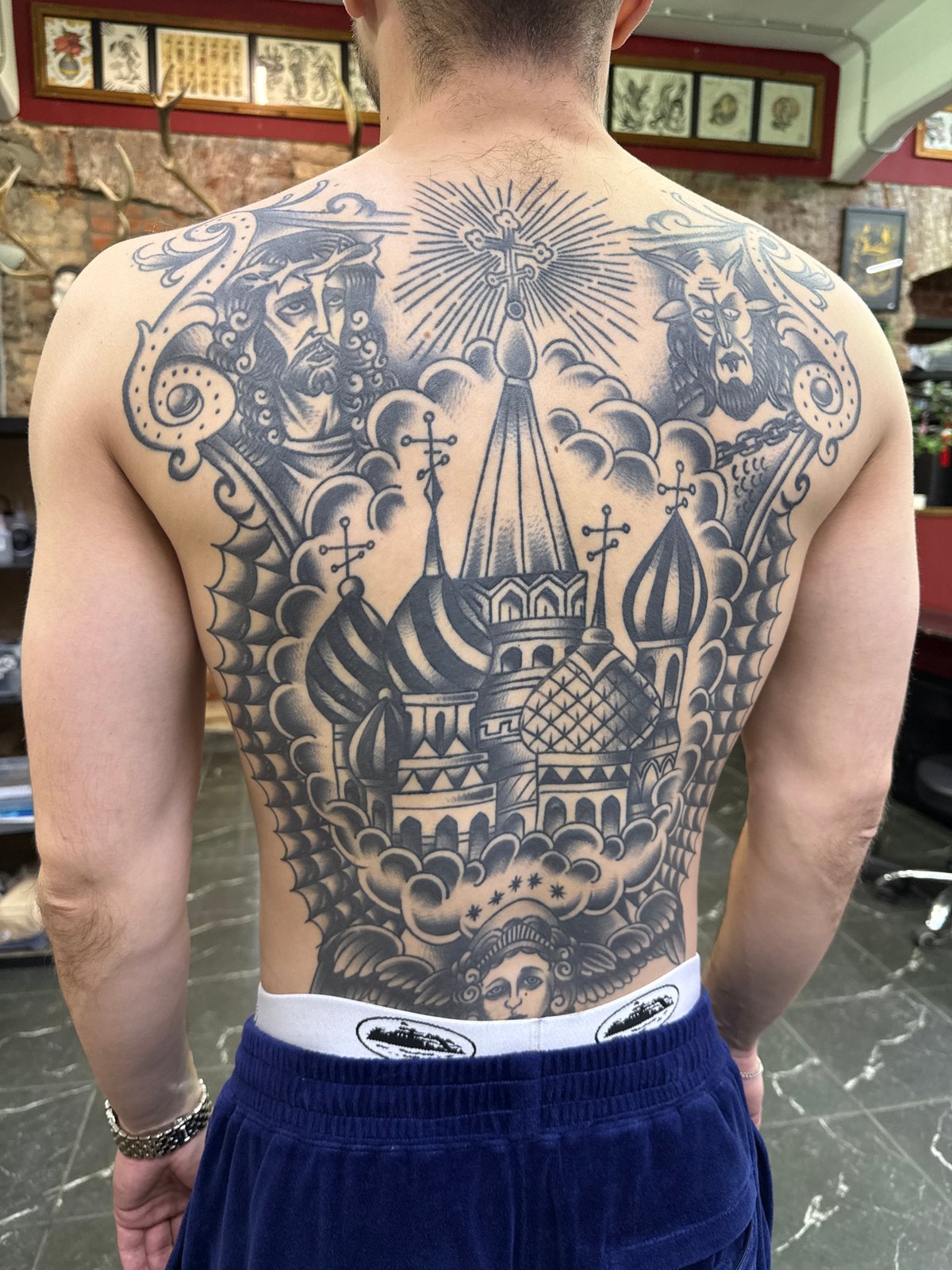 Moscow resident displays Saint Basil's Cathedral back tattoo