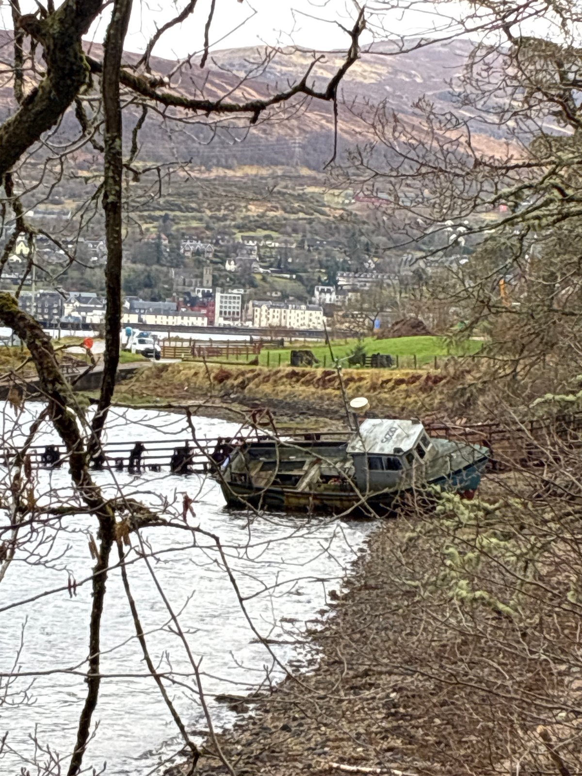Boat docked at Caledonian Canal in Fort William