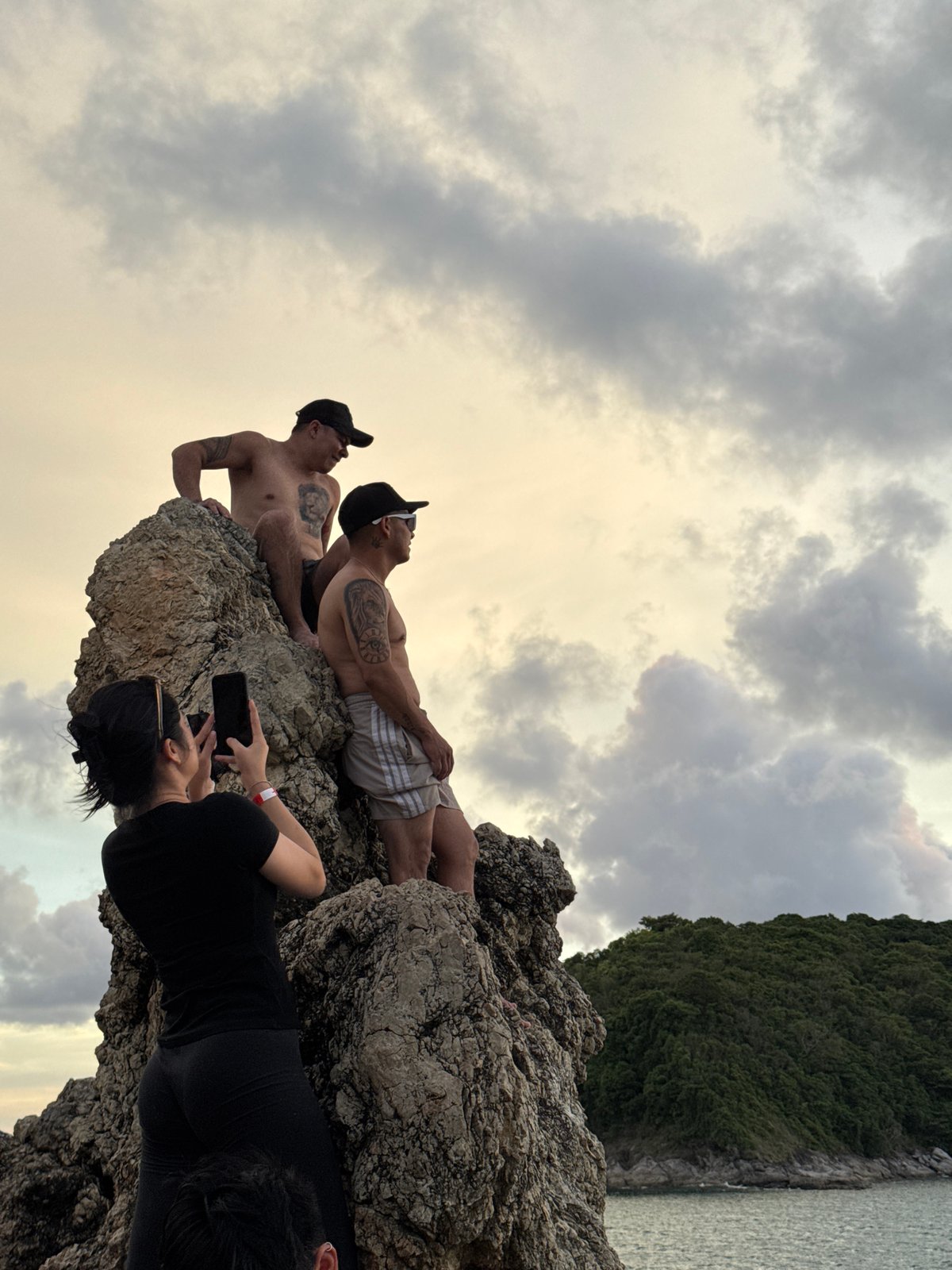 Crowd gathers at Rawai Beach for a dramatic Andaman sunset