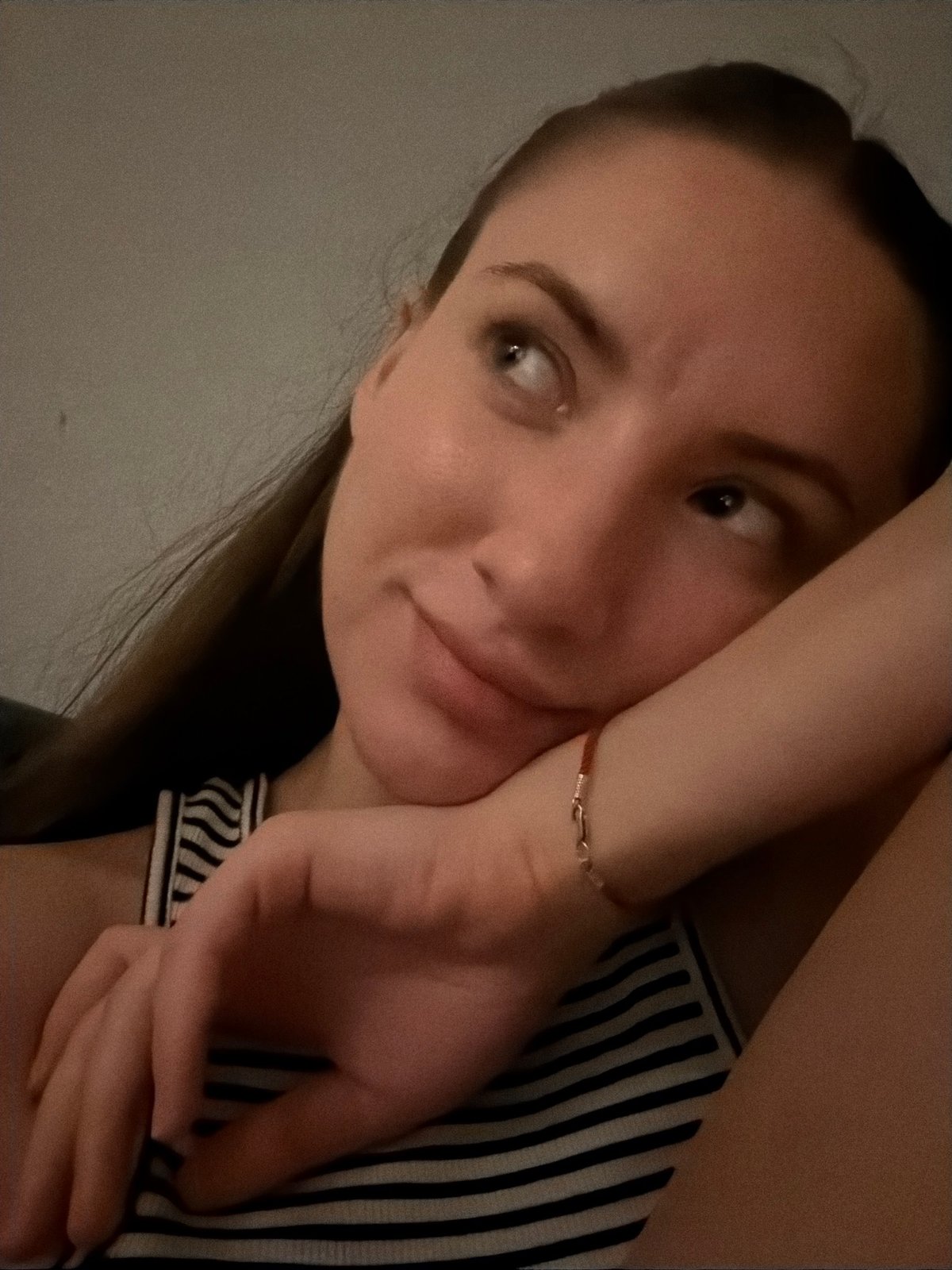 Low-light indoor portrait, resting pose, Sharm El Sheikh