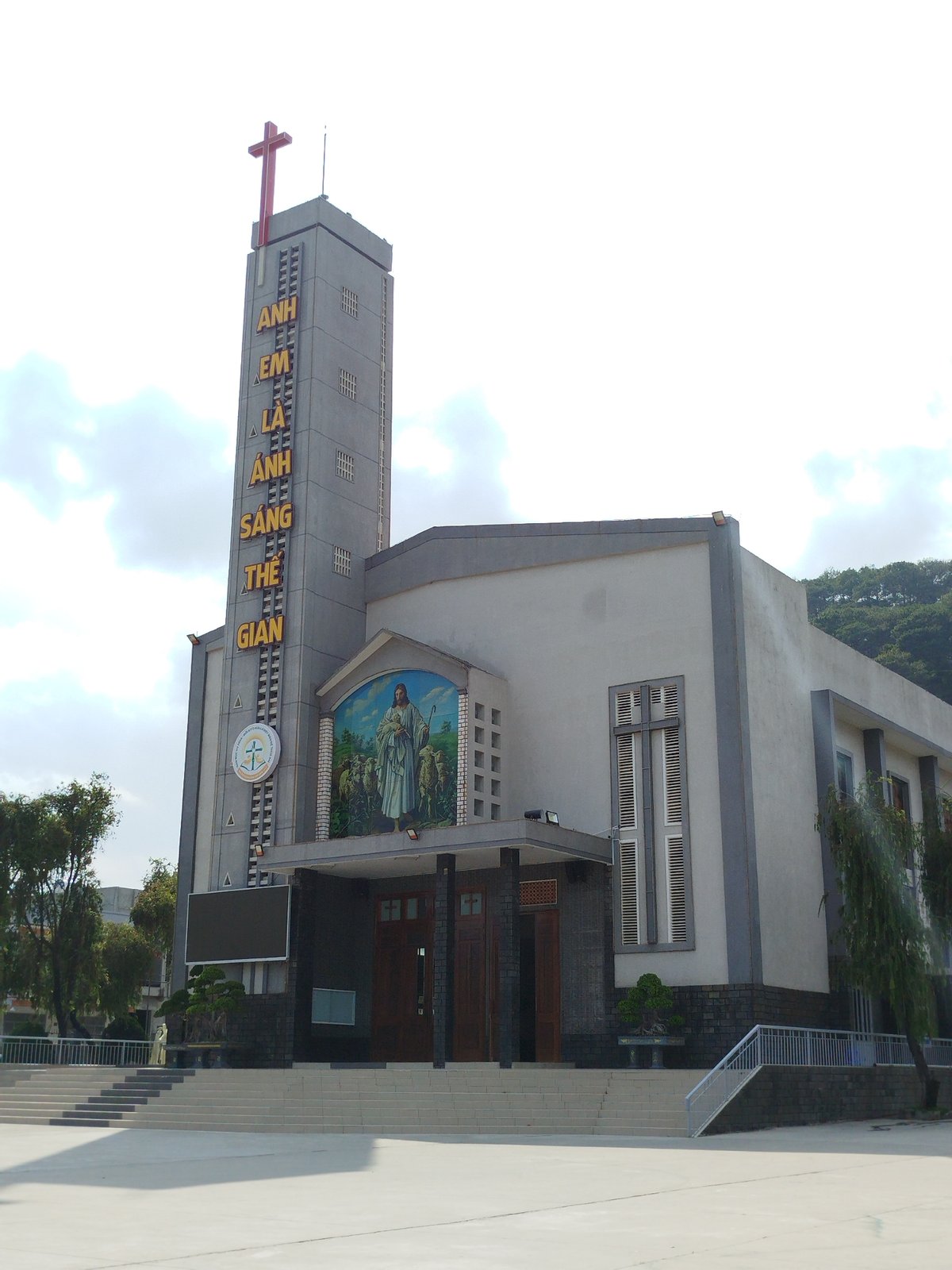 Modern Vietnamese church documented with exterior and decorated interior views