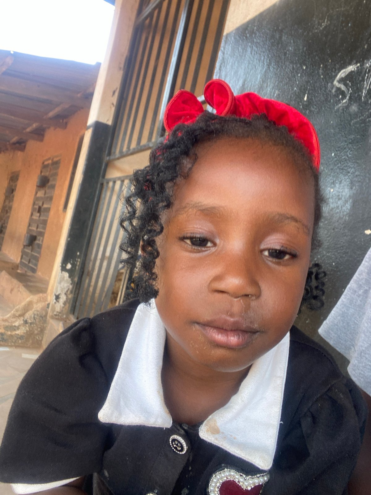 Young girl photographed in multiple poses in Kuru, Nigeria