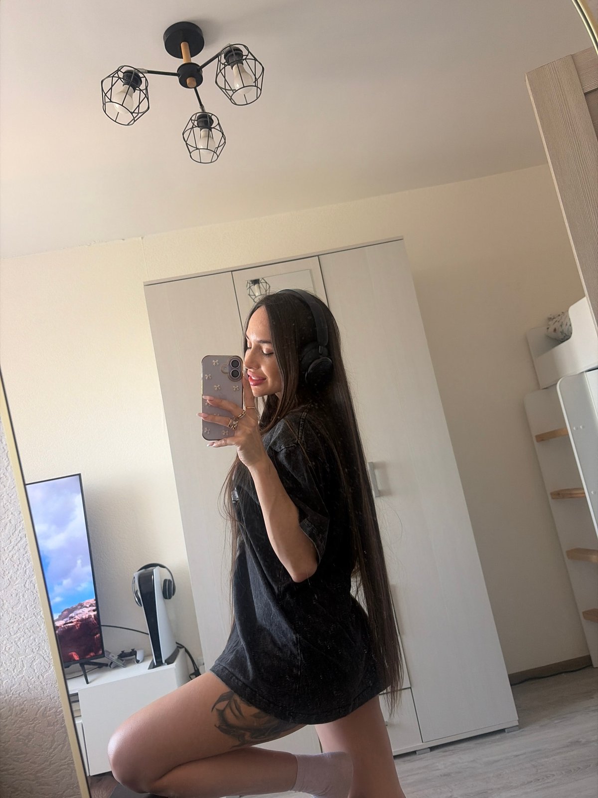 Woman takes mirror selfies in Saint Petersburg apartment