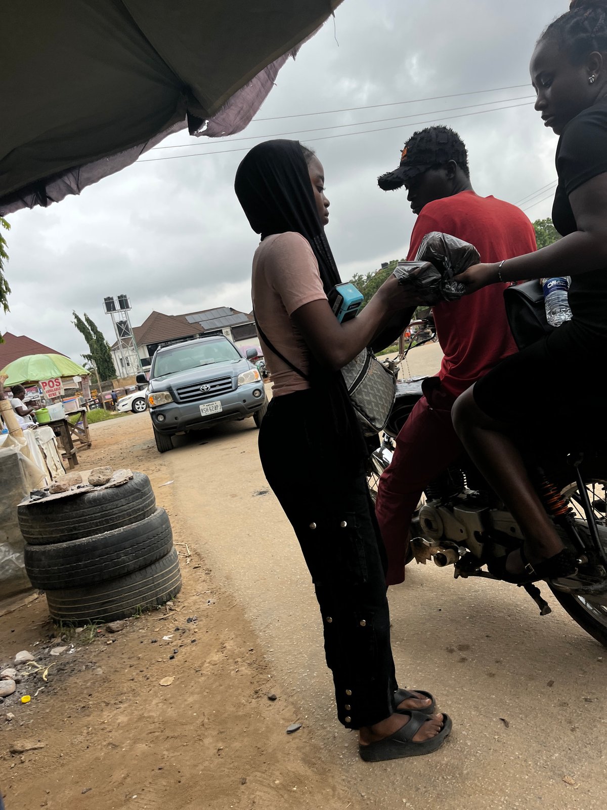 Morning street life documented across Abuja neighborhoods