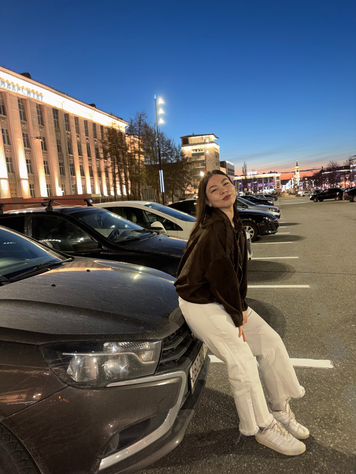Woman spotted during evening parking lot visit in Perm