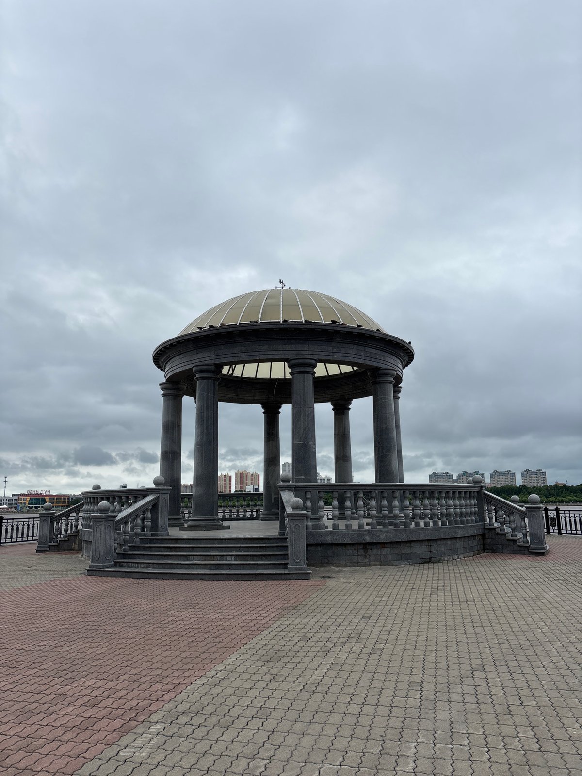 Amur River embankment life on a grey Blagoveshchensk morning