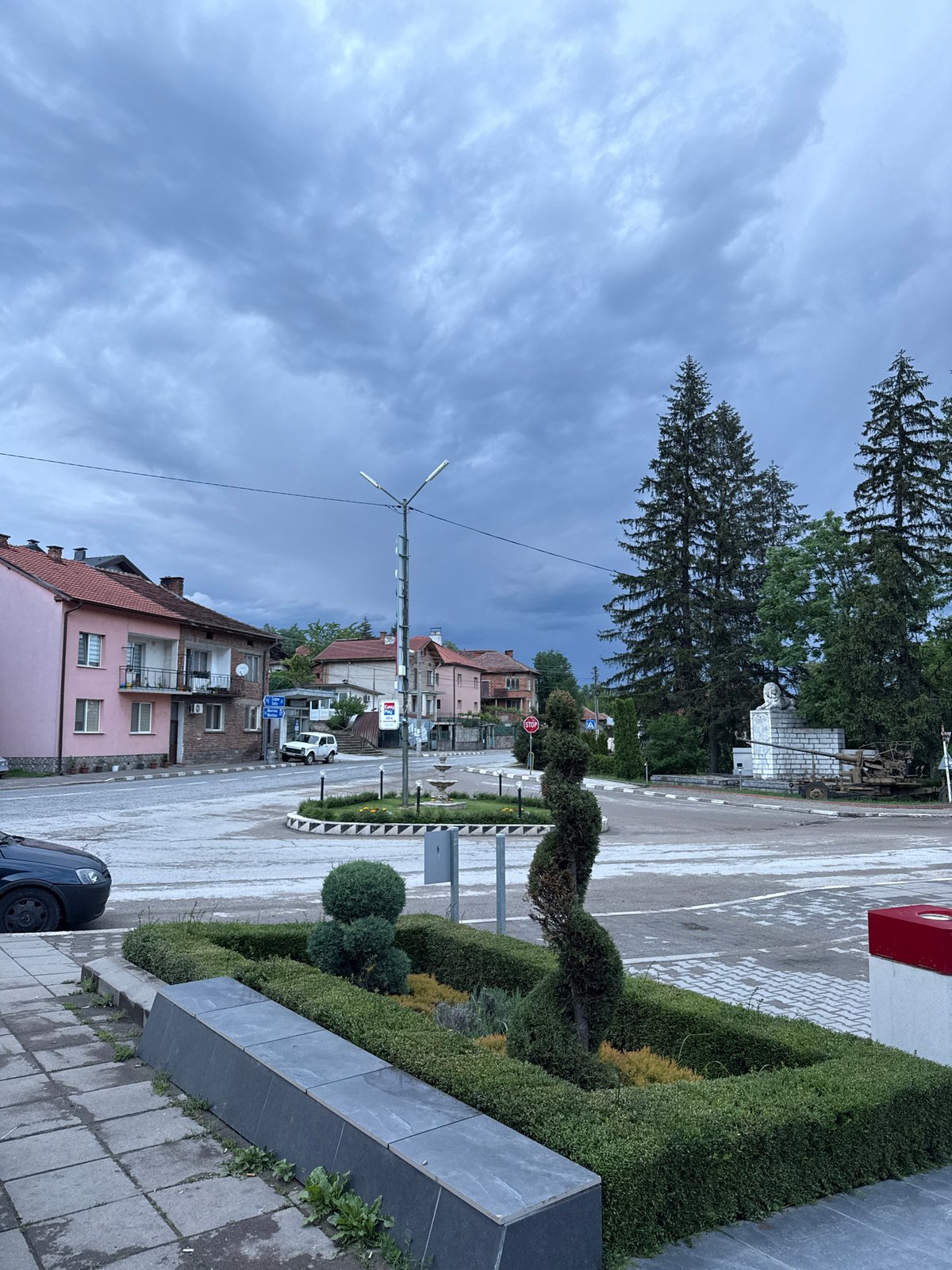 Overcast afternoon documented on Berkovitsa street with landscaped planters