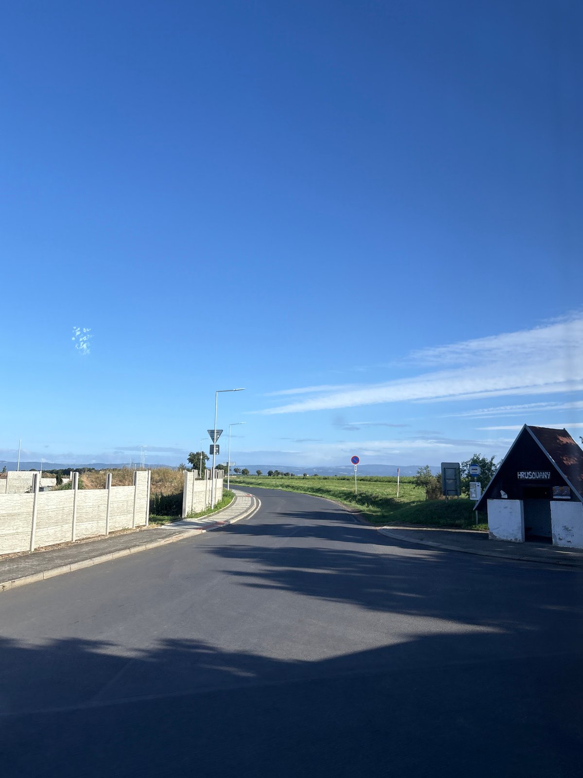 Early morning road trip through rural European countryside and small towns