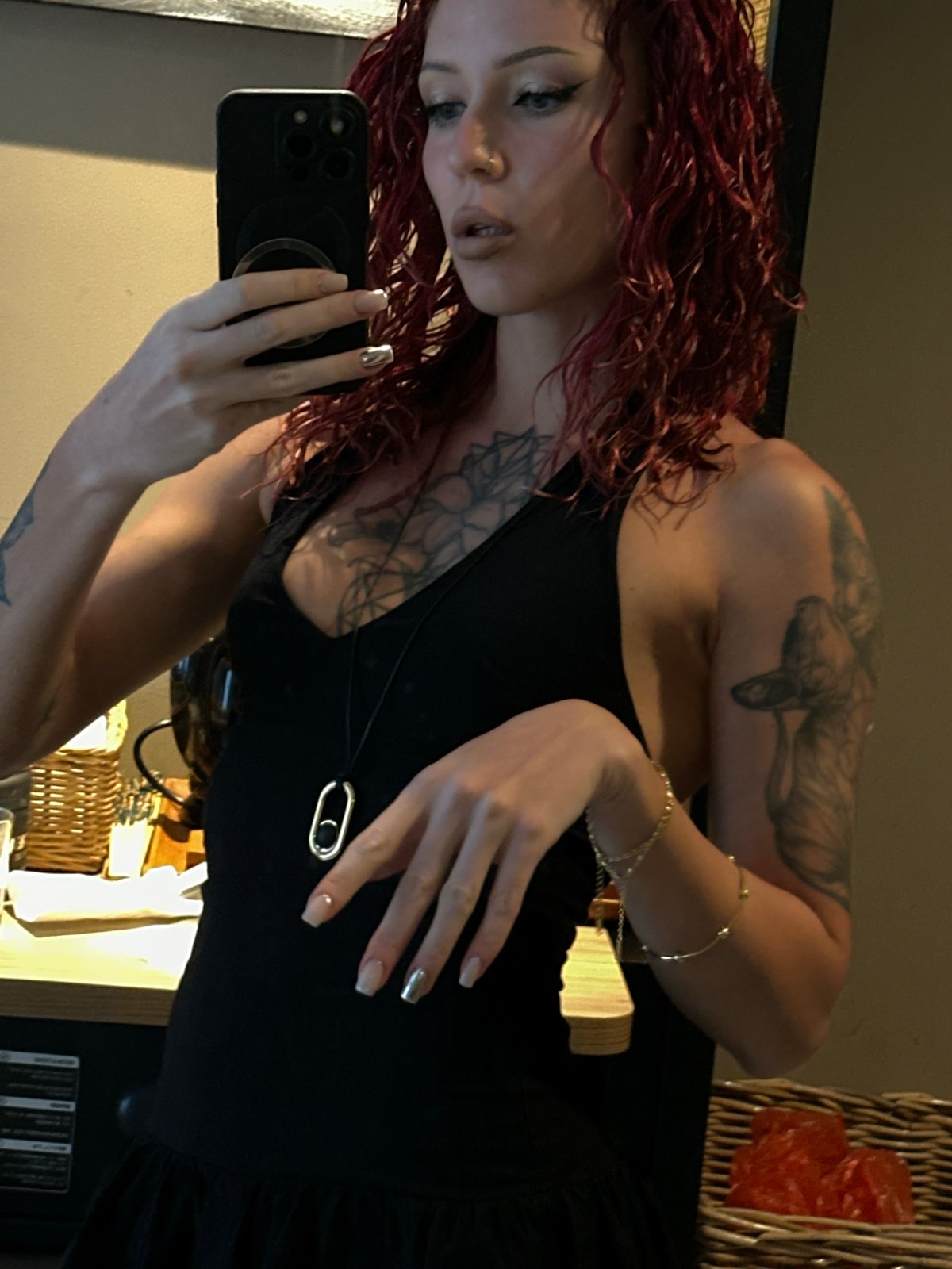 Woman documents manicure moment in Indonesia morning selfie session