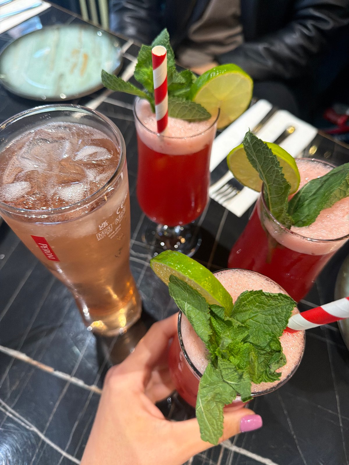 Lunch gathering at upscale Slavi Kitchen features cocktails and dining
