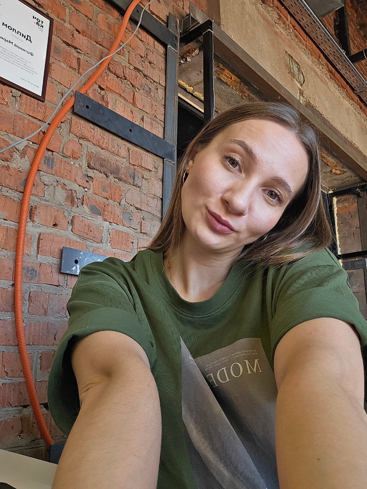 Woman poses for #CarryChallenge photo session in Chaikovsky