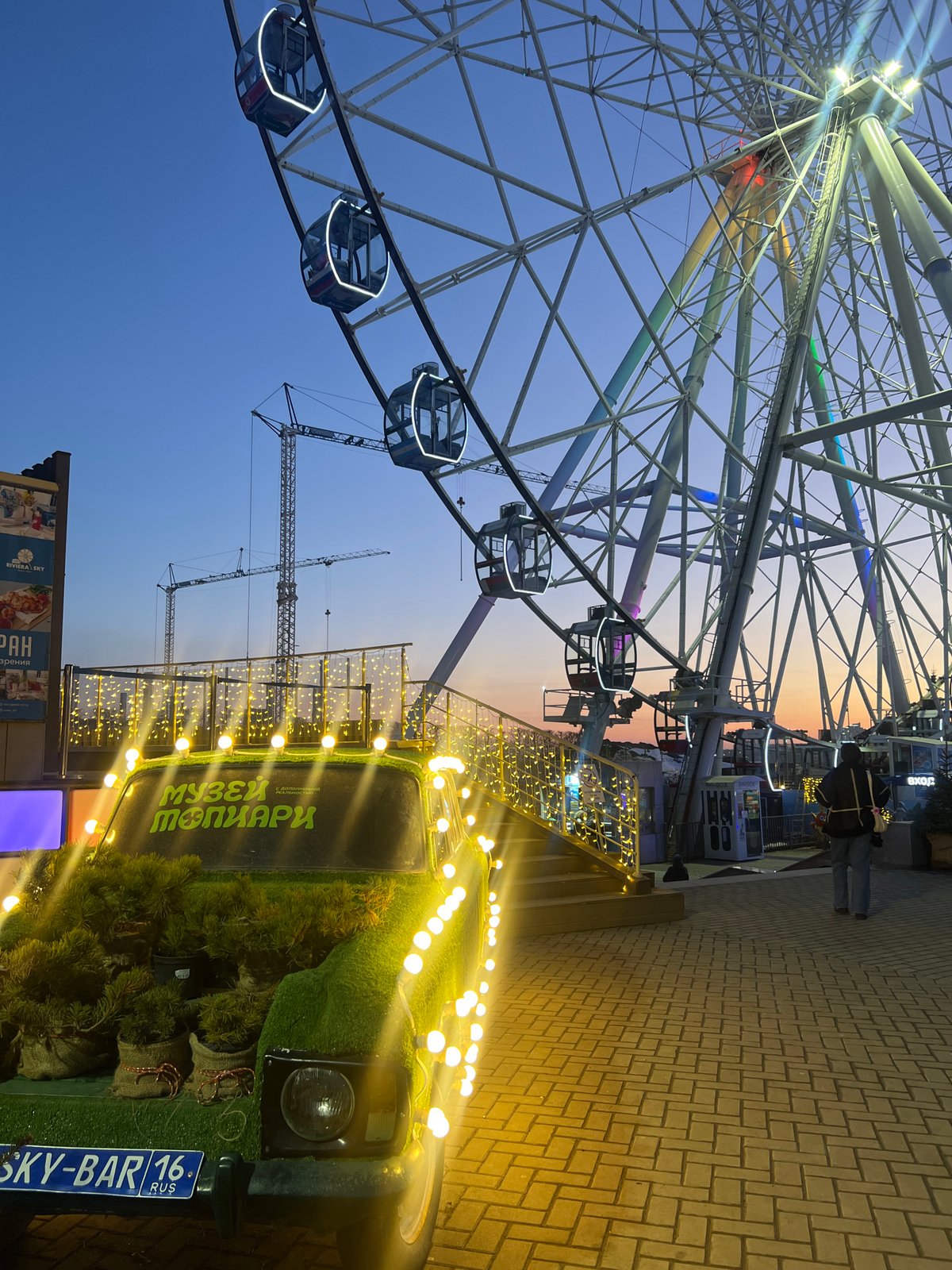 Ferris wheel captured at dusk in Kazan, Russia