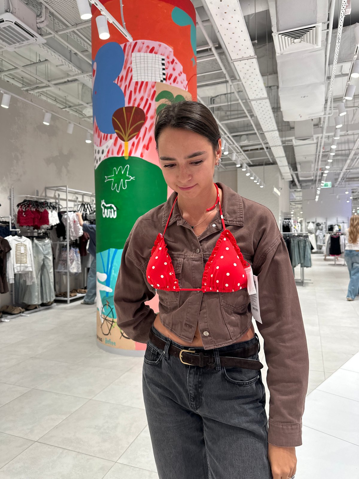 Outfit checks in a Moscow clothing store, June 2026