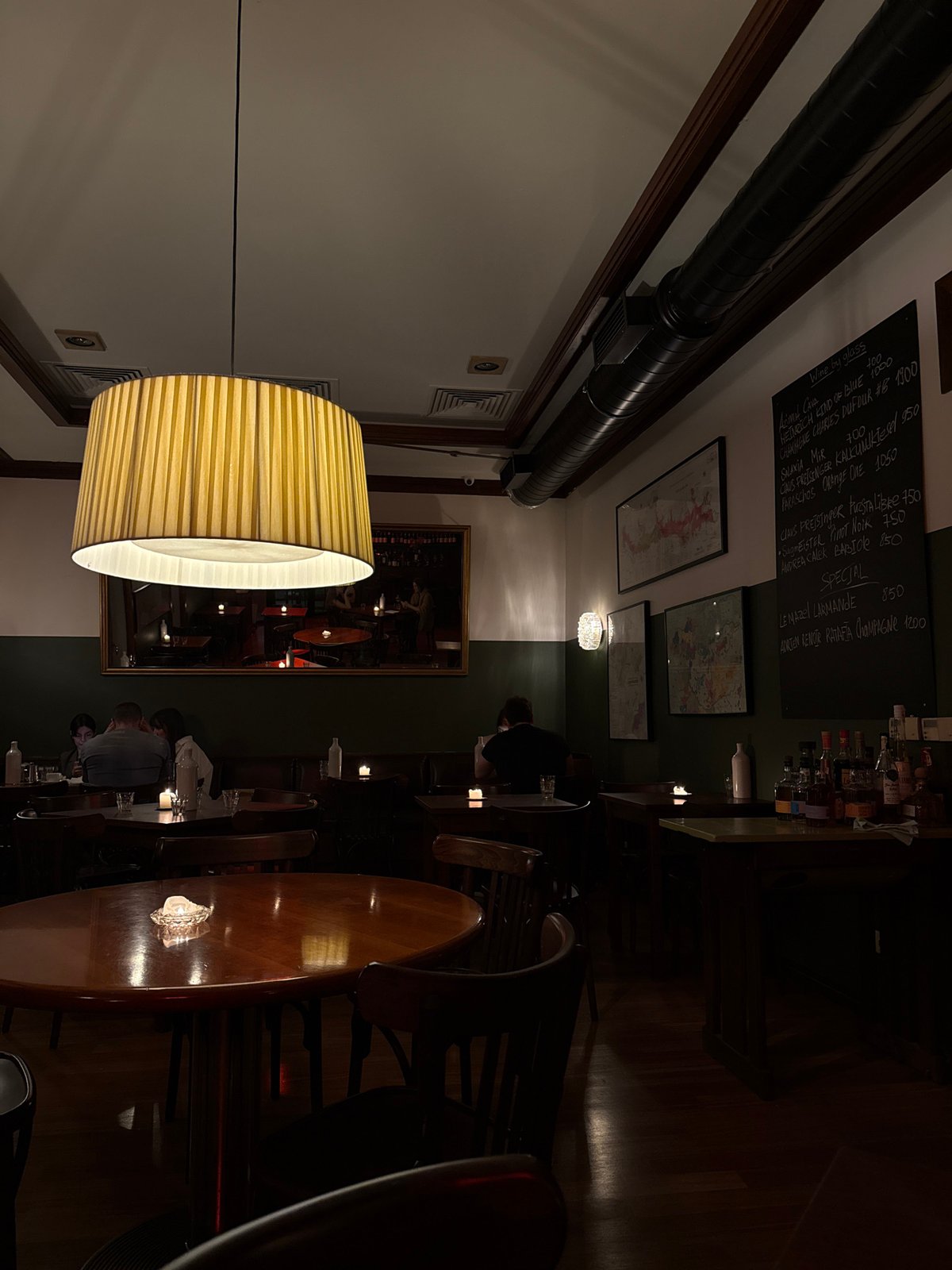 Evening documentation of Belgrade restaurant interior shows modern industrial design