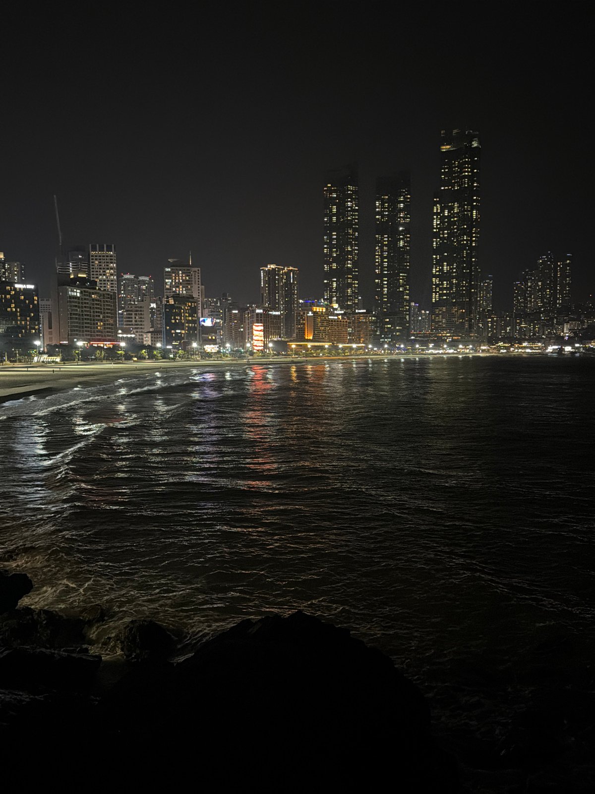Busan skyline captured from waterfront at night