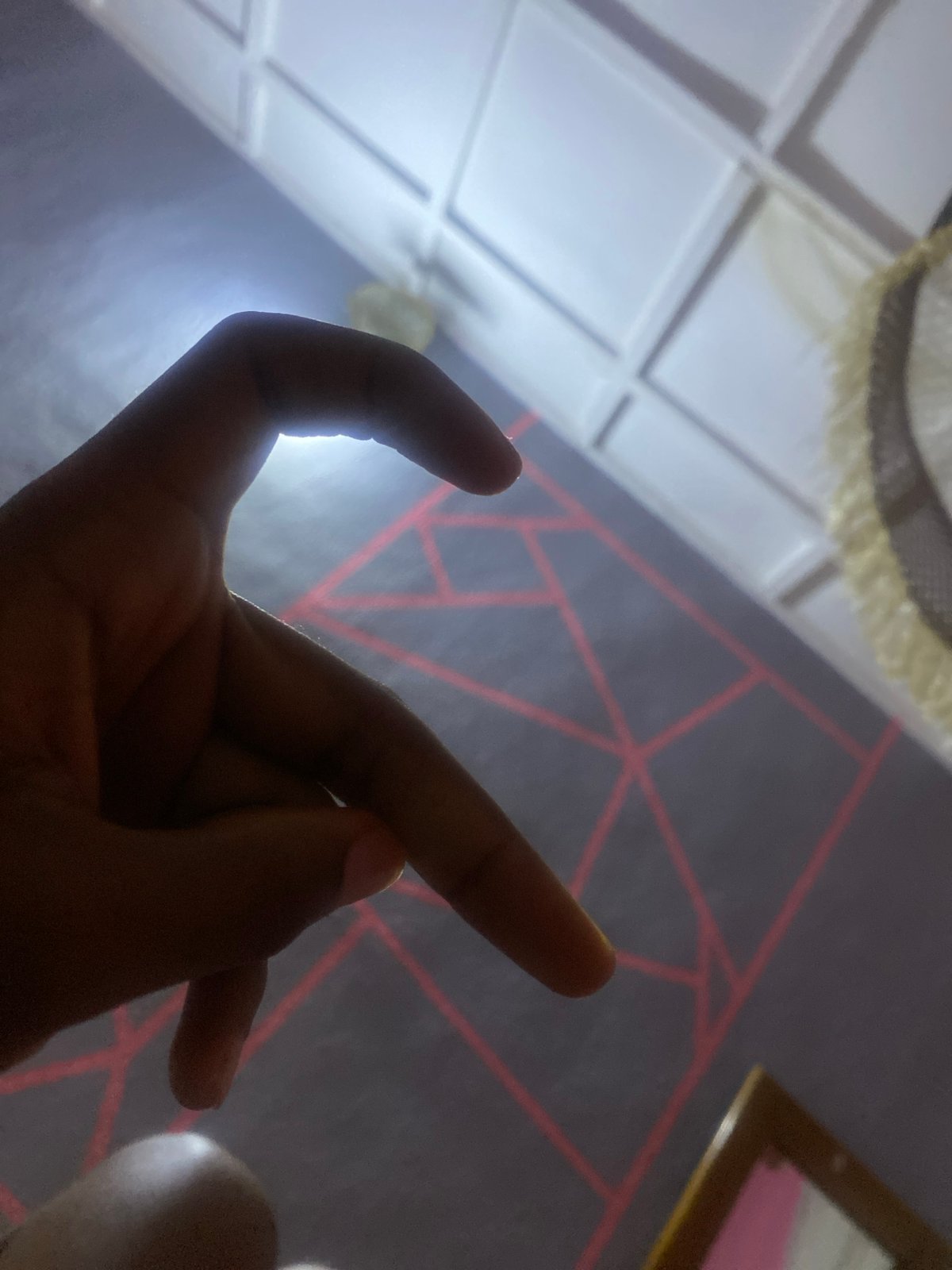 Indoor selfie session with worn currency documented in Jos