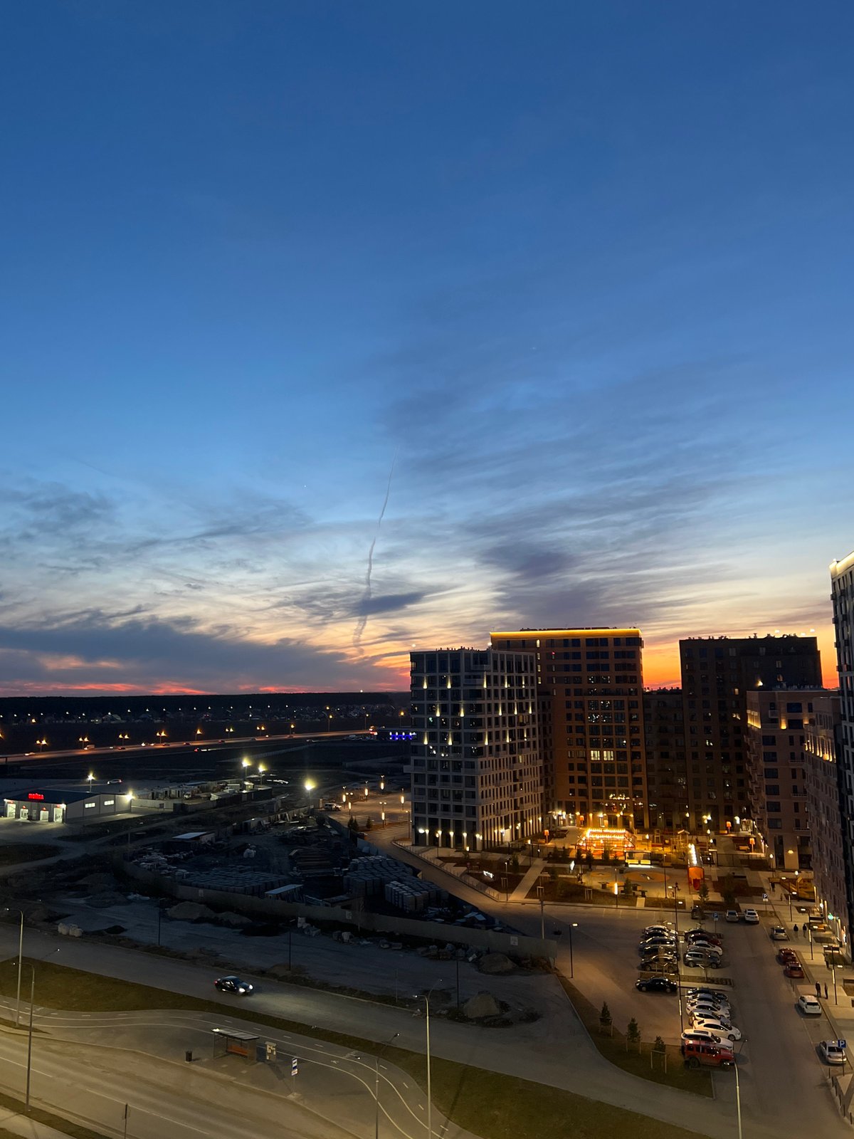 Evening scenes captured in Tyumen: cityscape and indoor selfie