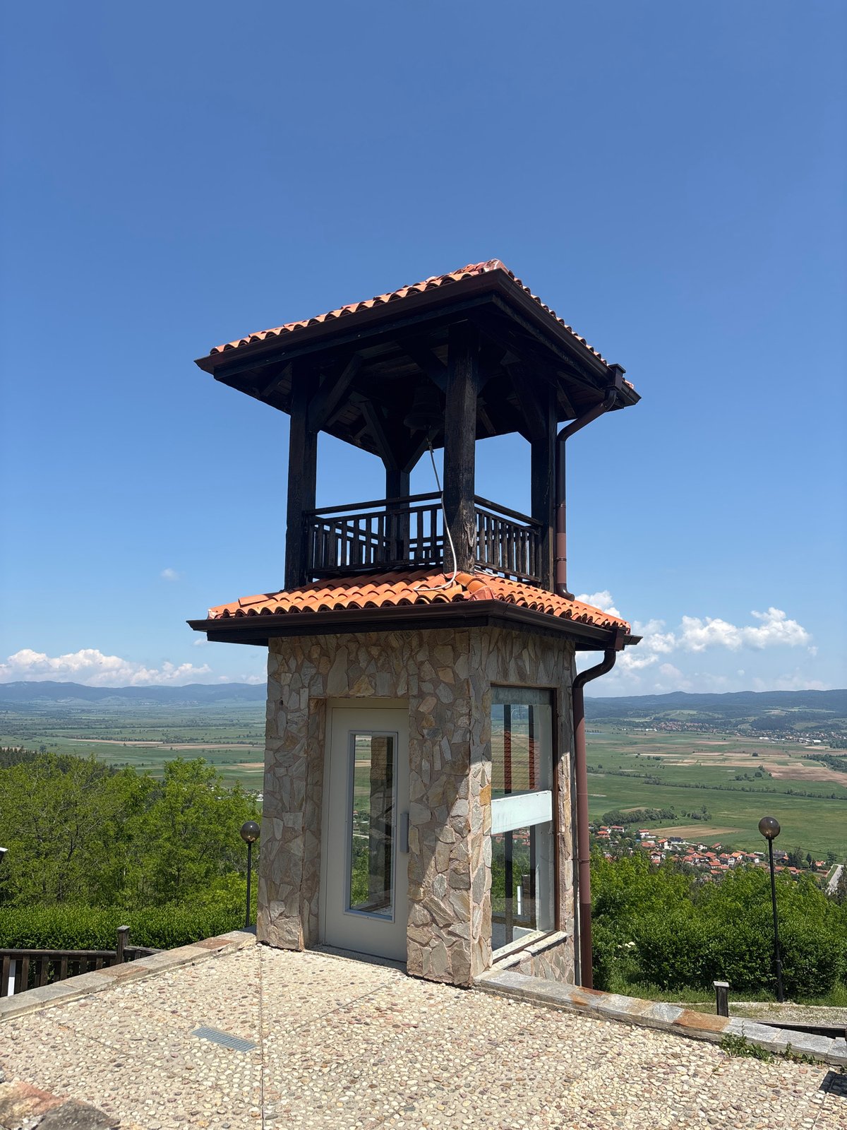 Visitors document medieval fortress complex during morning tour in Bulgaria