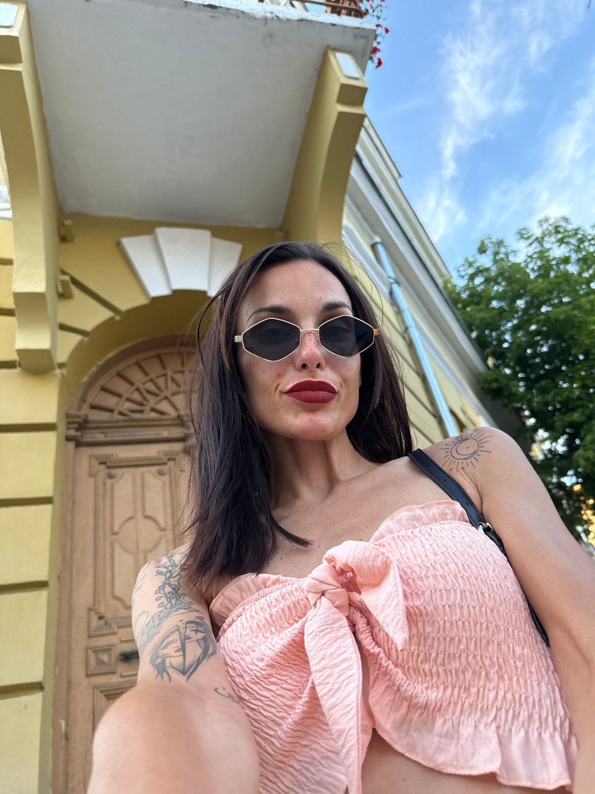 Woman poses for photos in central Pleven, Bulgaria