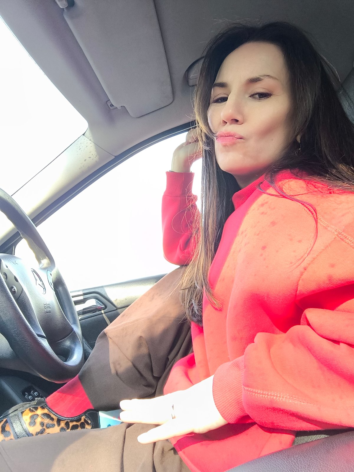Woman in red sweatshirt spotted in early morning Riga