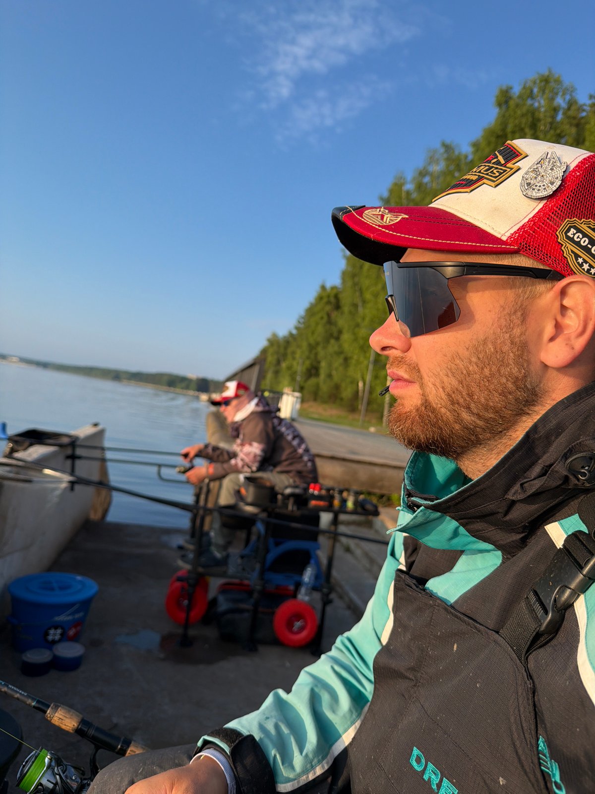 Fishing scene along Chaikovsky waterway on sunny June day