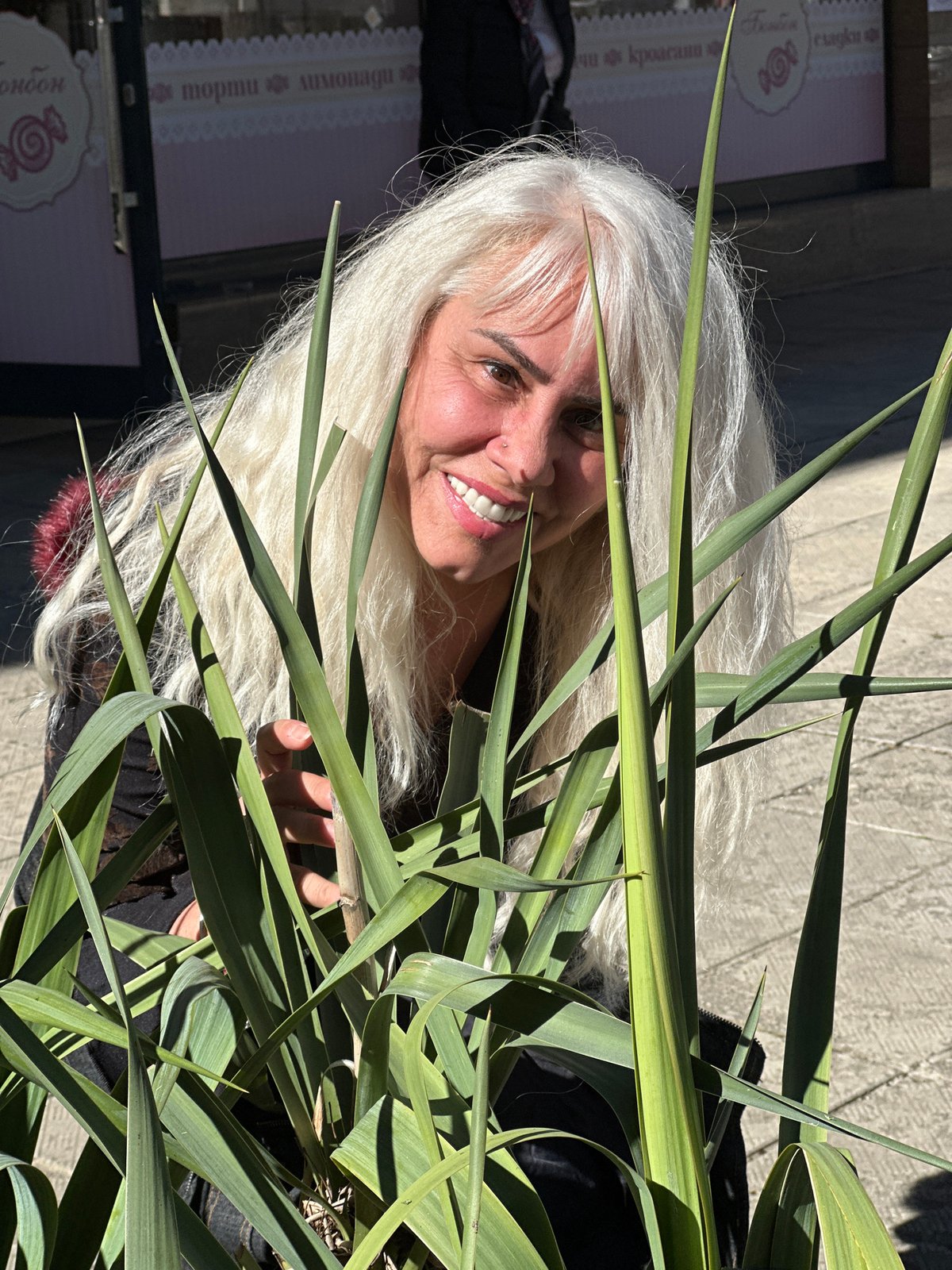 White-haired woman photographed around Sofia parks and streets