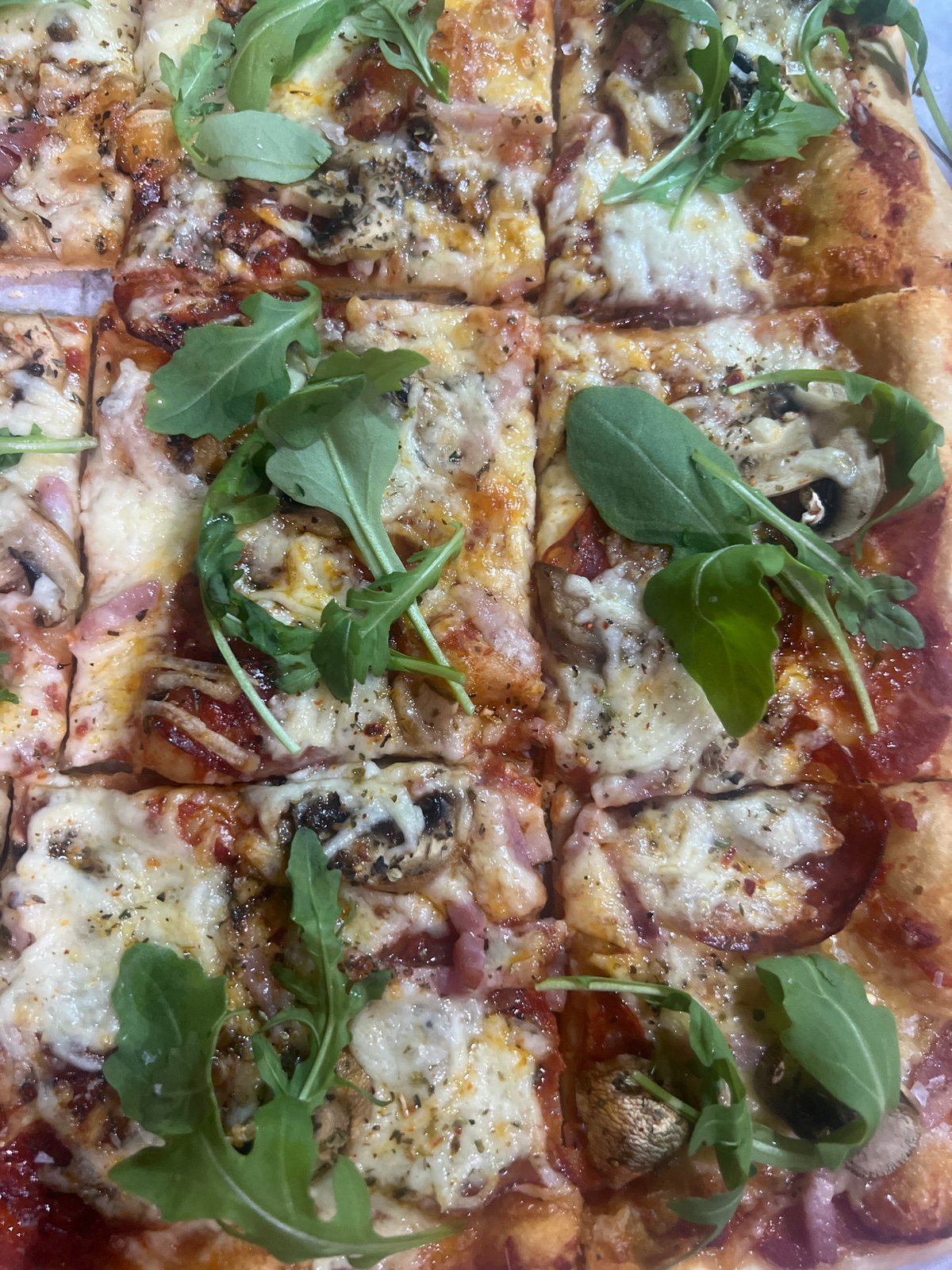 Everyday moments documented in Mollet Del Vallès: pizza, tiles, portrait