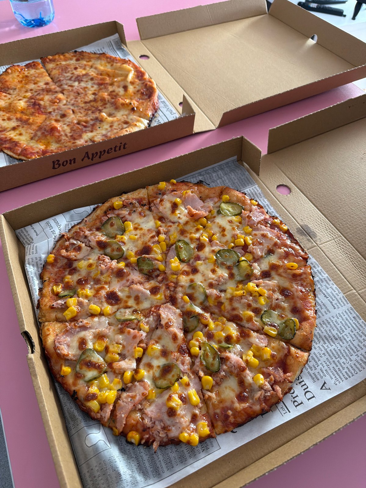 Pizza takeout meal documented in Sofia during afternoon hours