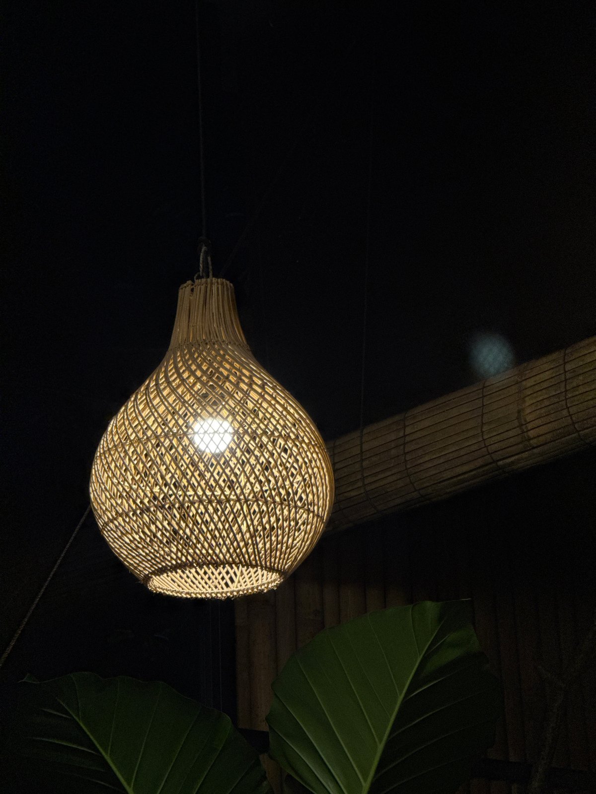 Artisan décor and tea service at a Sukawati night spot