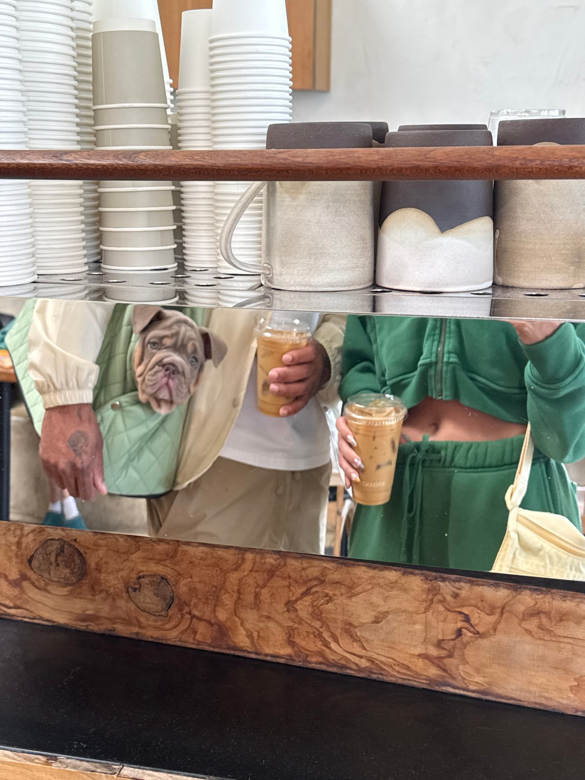 Person and dog spotted in LA cafe mirror reflection