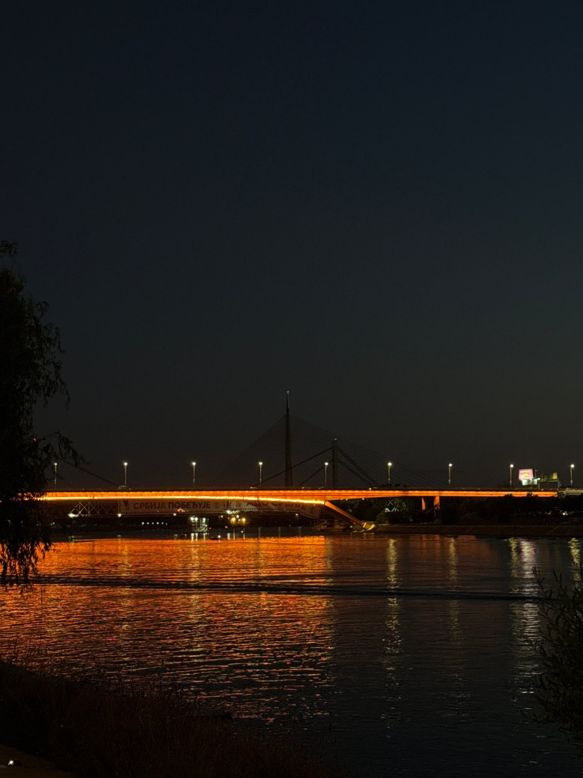 Belgrade's Ada Bridge and Waterfront glow on a July night
