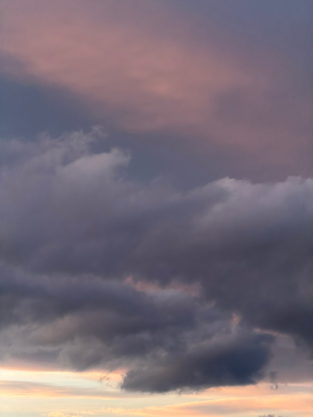 Dusk storm clouds and historic church documented in Bragança