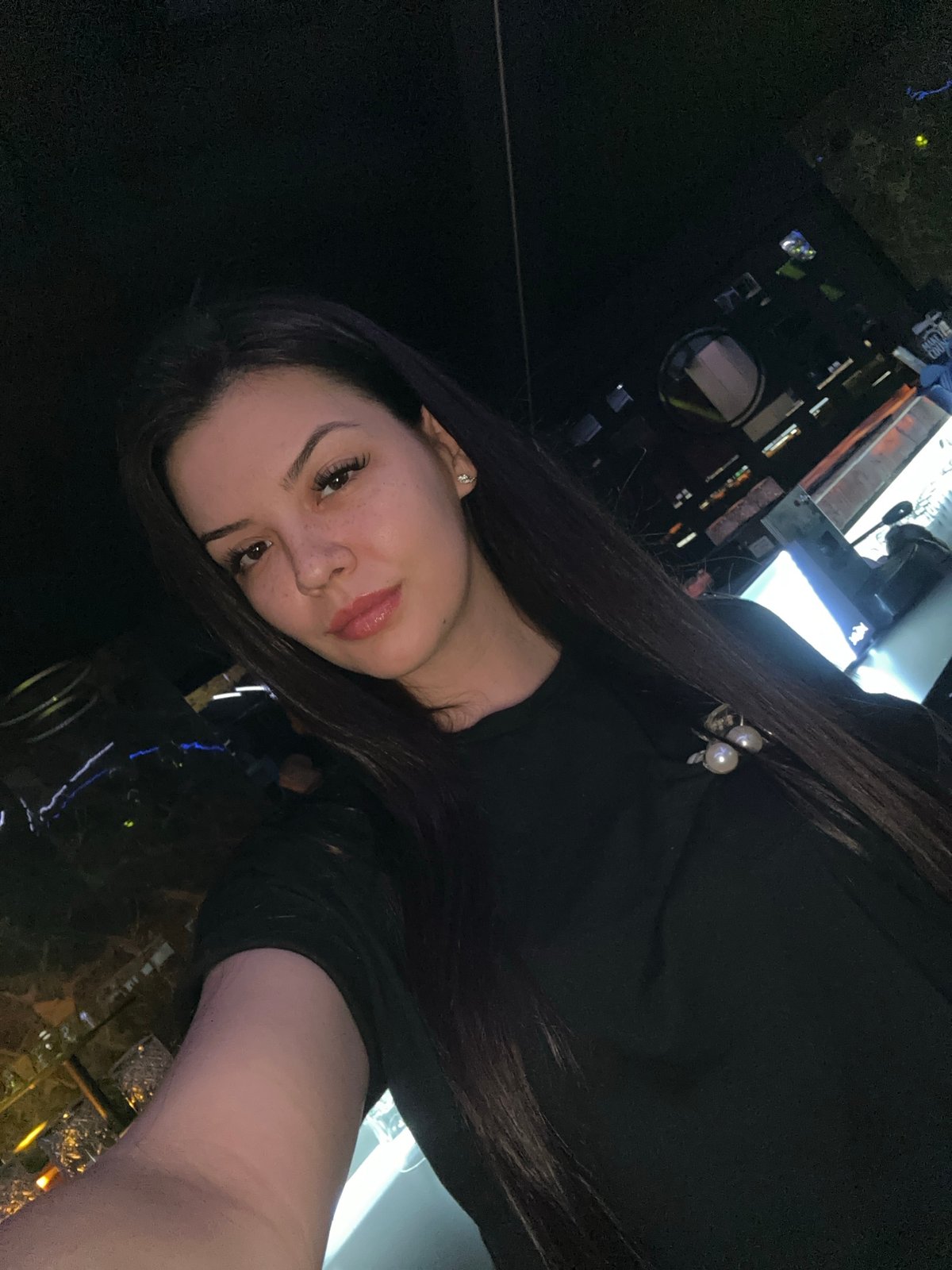 Night out selfies at a dimly lit club in Sliven