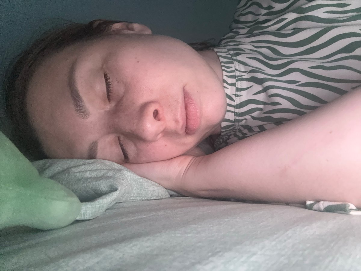 Woman rests peacefully in Moscow bedroom