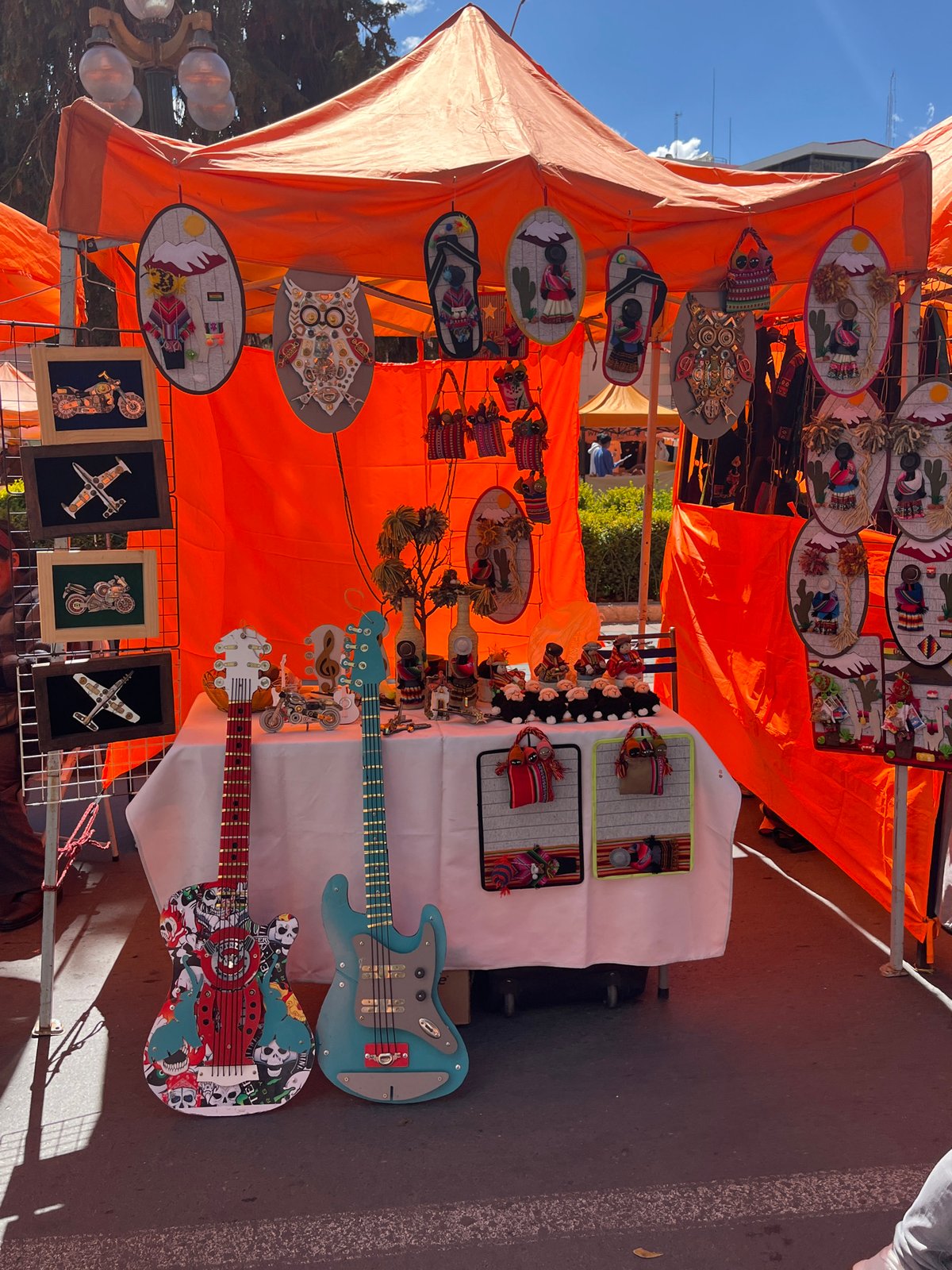 Street vendors and shoppers active in La Paz market district