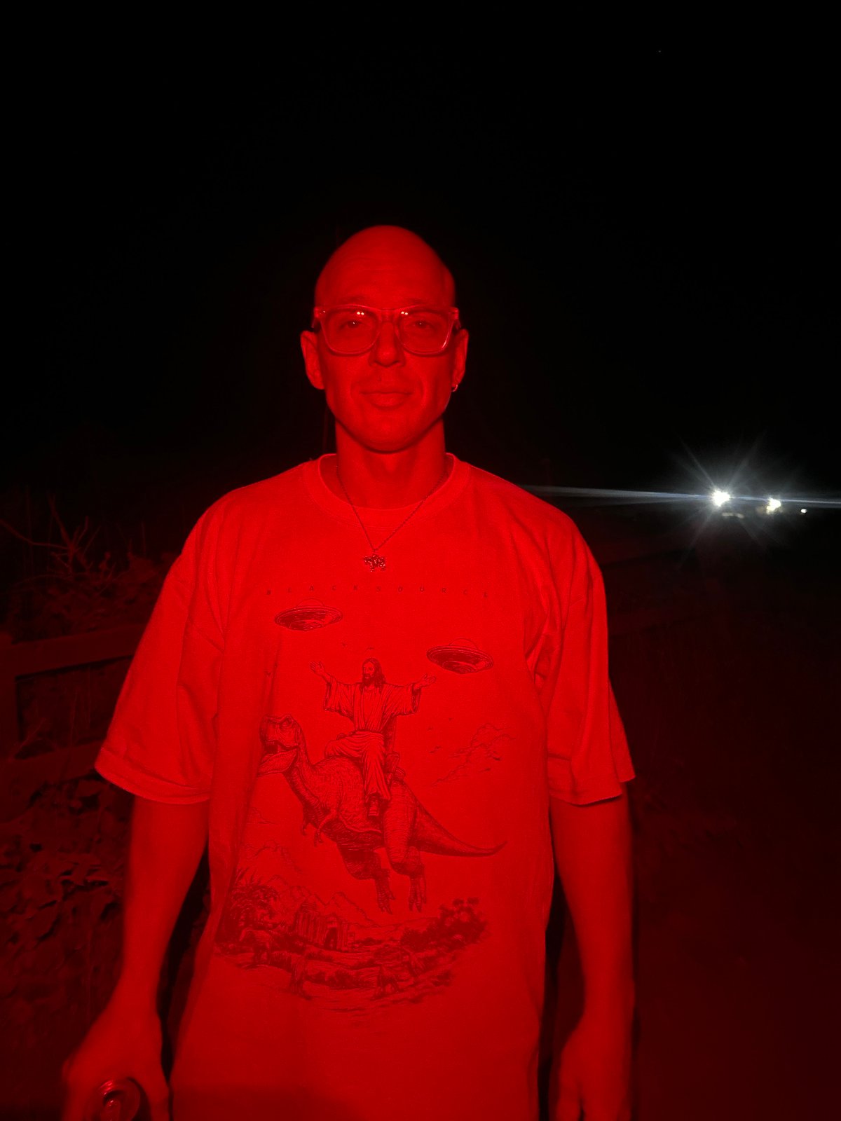 Red-lit night scene and moonlit darkness in Ulcinj