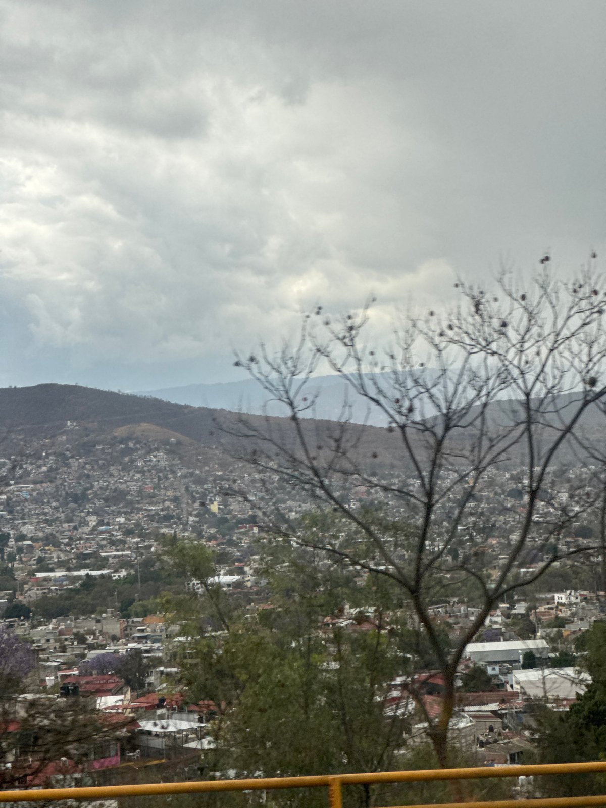 Cloudy evening view captured of Oaxaca City from elevated position